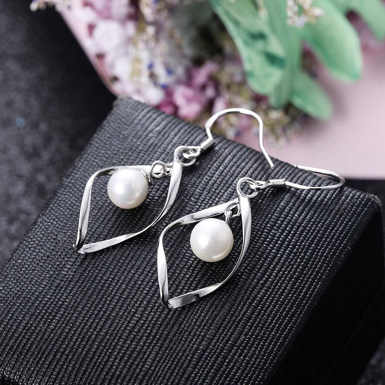 Elegant Pearl Drop Twist Drop Earrings designed in Italy, featuring 18K white gold plating and embellished with sparkling Austrian crystals.