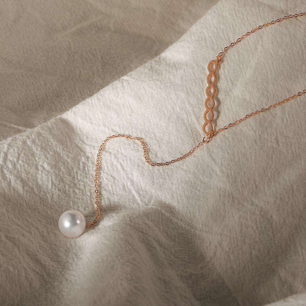 Elegant Pearl Lariat Necklace made from surgical stainless steel with 14K gold plating, featuring a beautiful pearl accent.