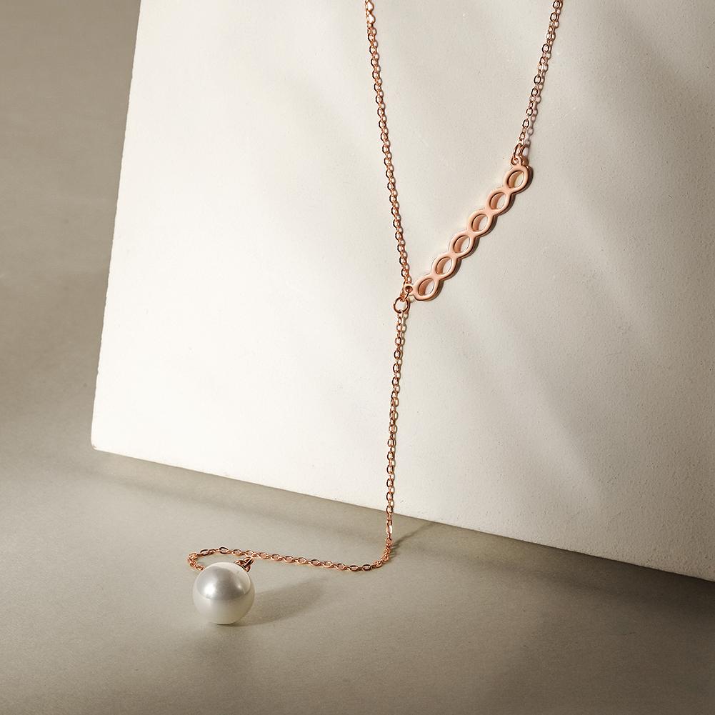 Elegant Pearl Lariat Necklace made from surgical stainless steel with 14K gold plating, featuring a beautiful pearl accent.