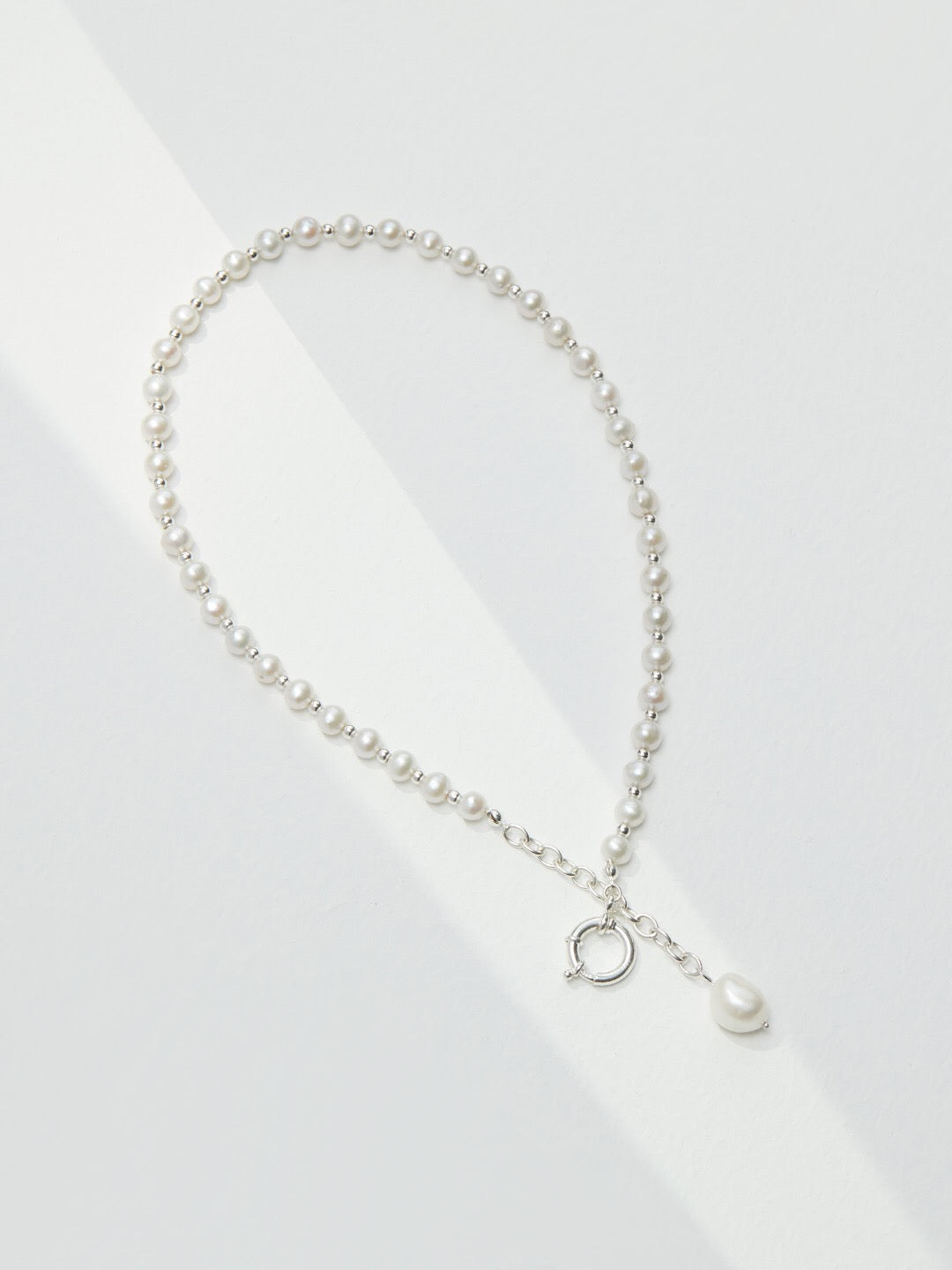 Elegant Pearl Pendant Adjustable Necklace featuring genuine freshwater pearls and sterling silver, perfect for any occasion.