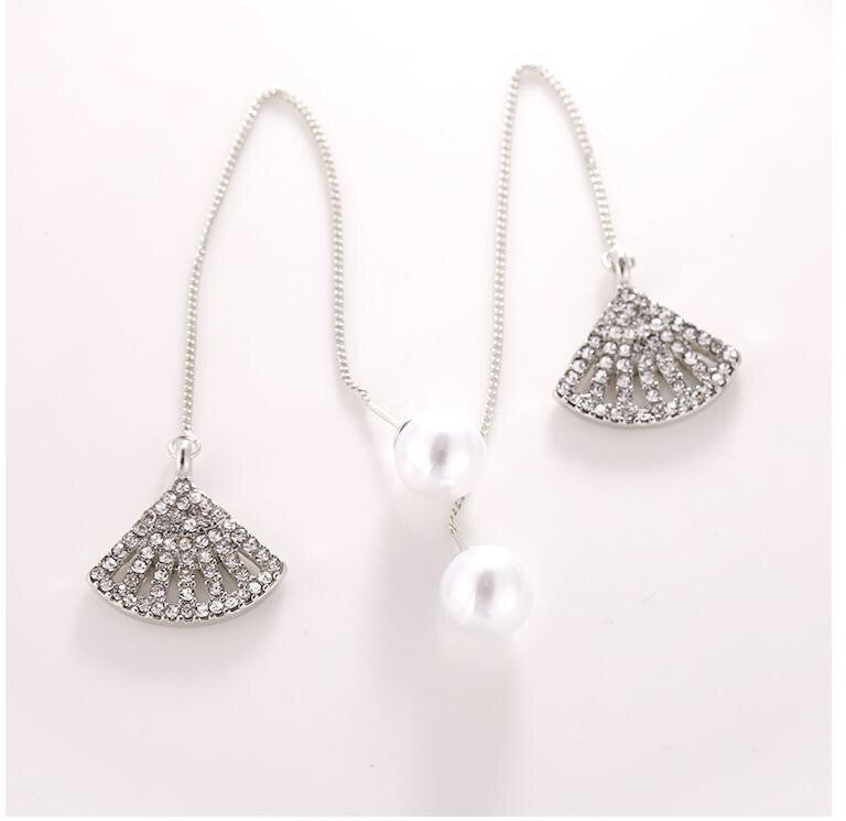 Elegant pearl stud earrings with long chained rhinestone fan design, showcasing a blend of sophistication and modern style.