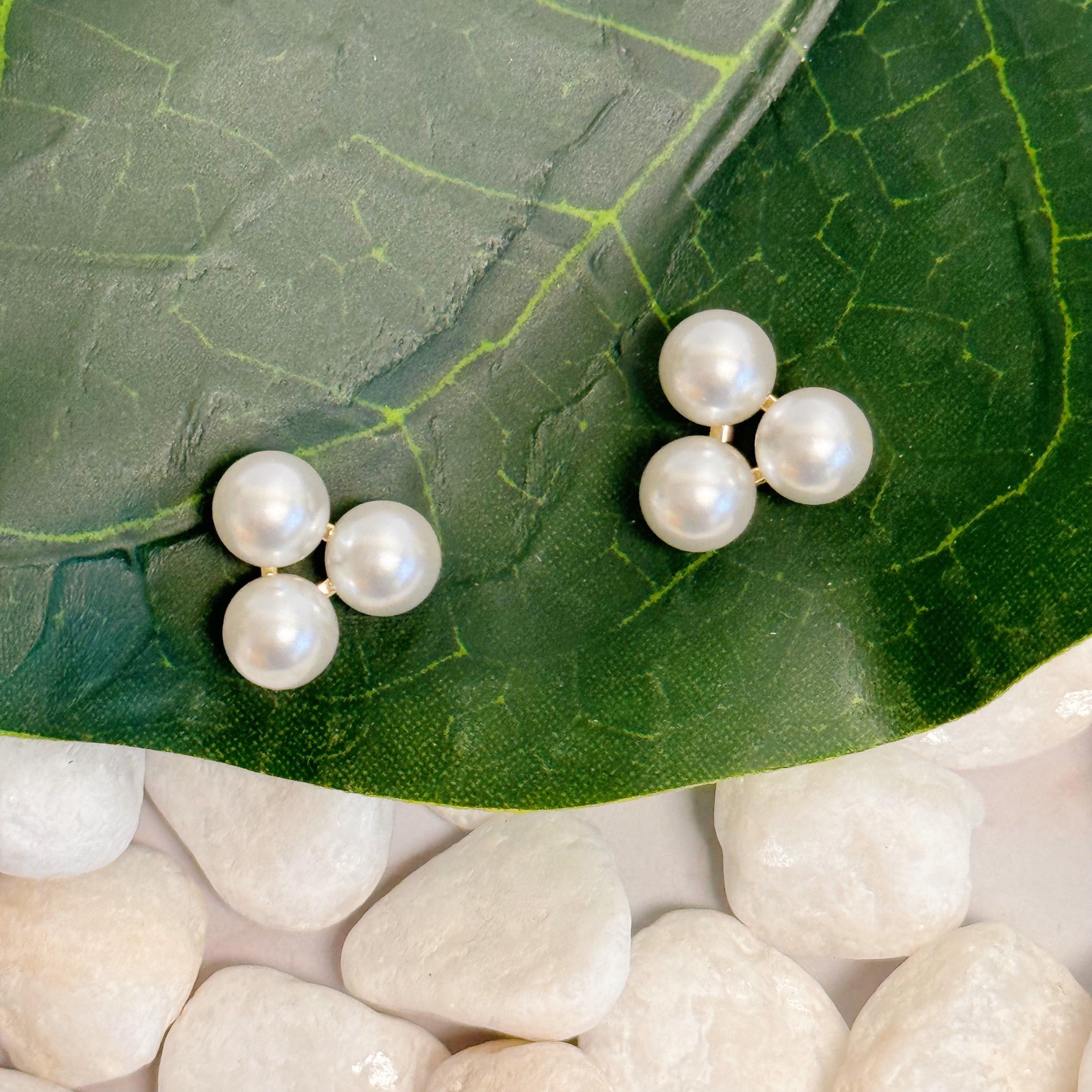 Elegant Pearl Trio Stud Earrings featuring three glass pearls set in 18k gold plated brass, perfect for any occasion.