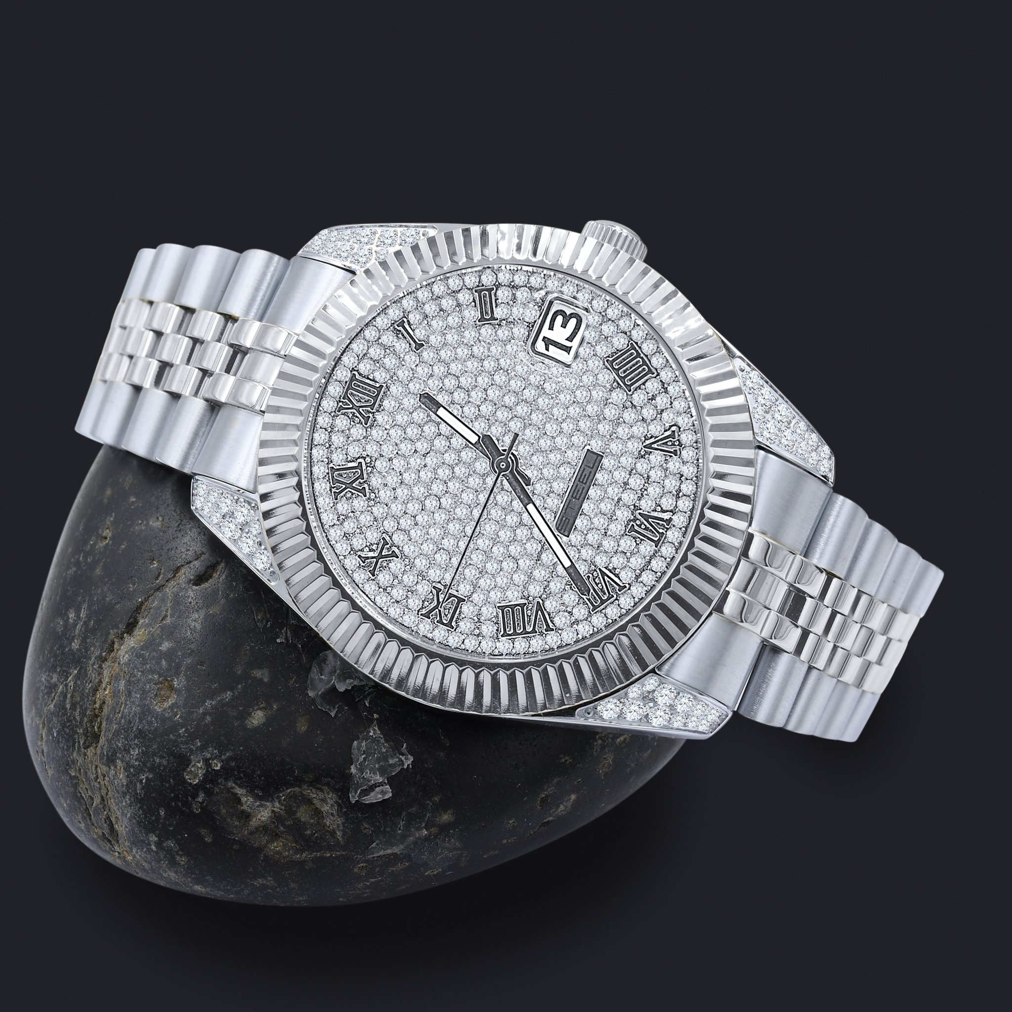 PEART Steel Timepiece featuring a stainless steel strap and cubic zircon stones on the dial, showcasing Roman indices and a date-display window.