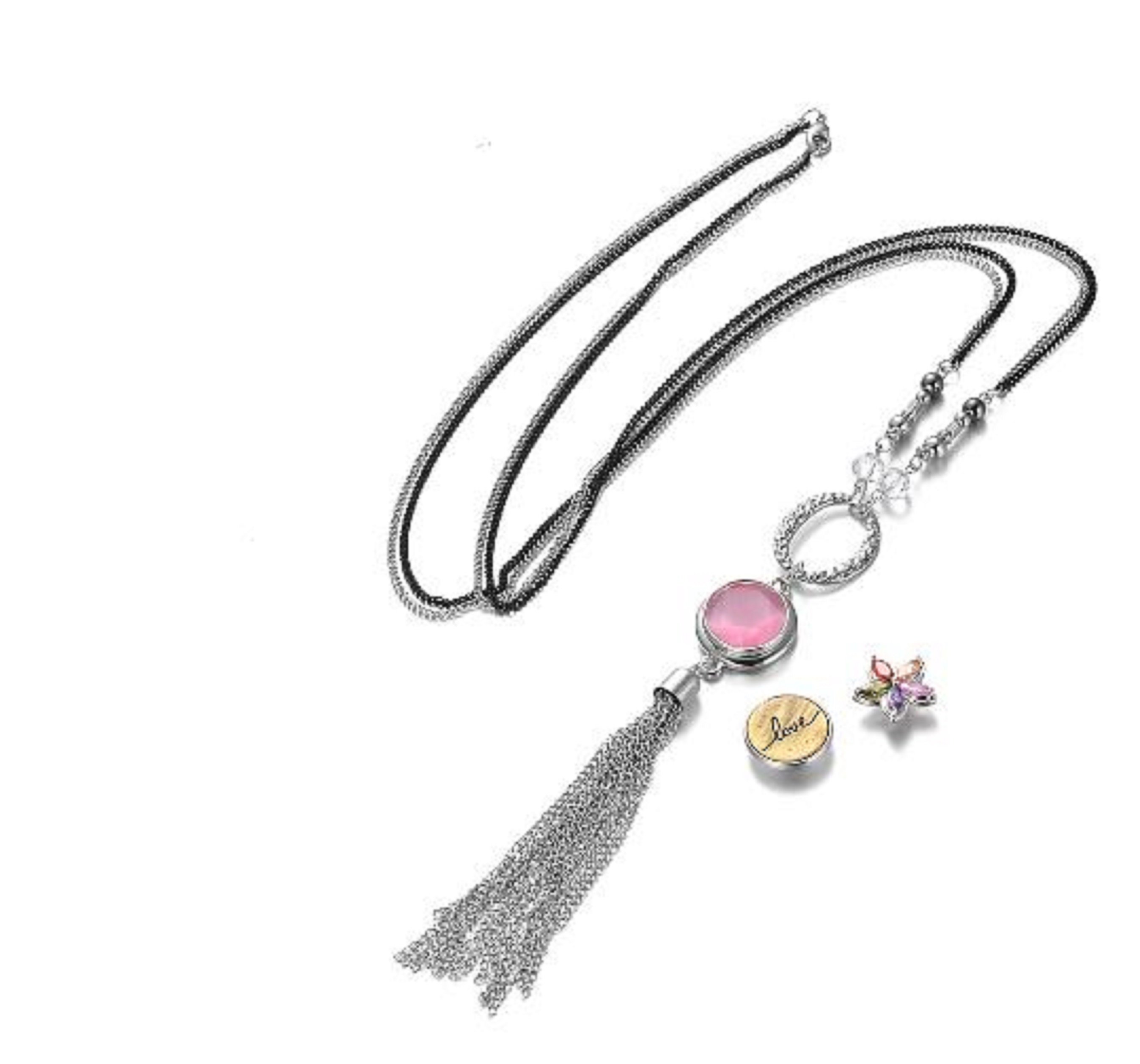 Tassel Pendant Necklace featuring a decorative chain and snap base, showcasing a stylish design for versatile wear.