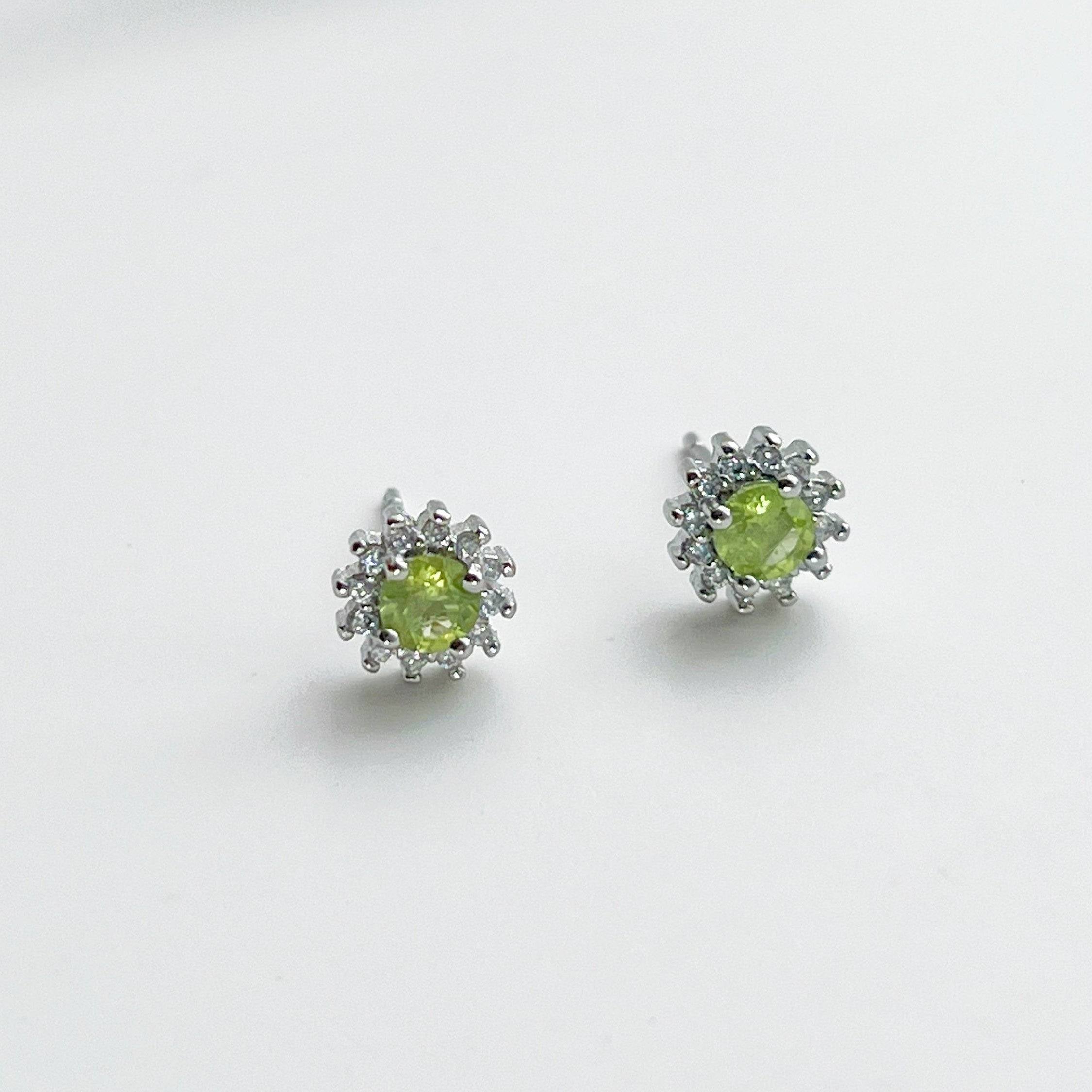 Elegant Peridot Earrings featuring natural green gemstones set in sterling silver, perfect for August birthdays.