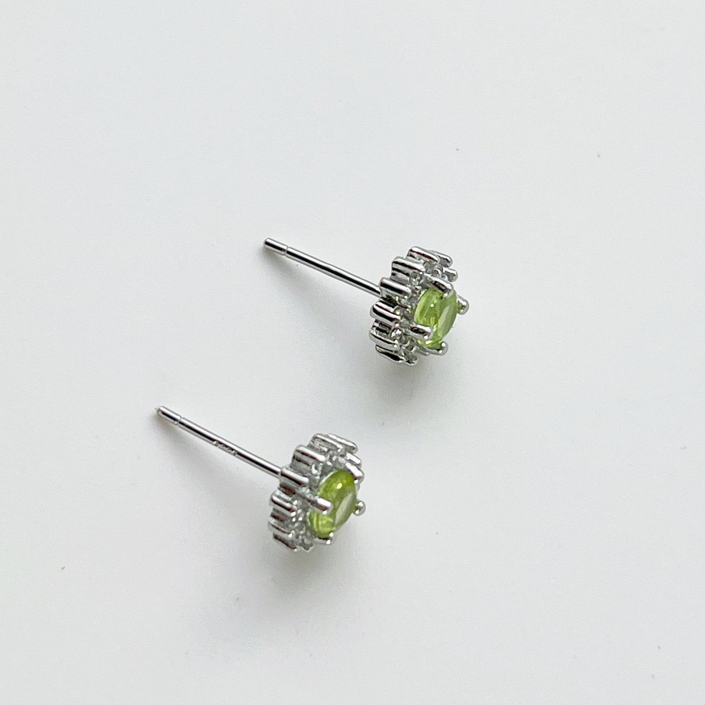 Elegant Peridot Earrings featuring natural green gemstones set in sterling silver, perfect for August birthdays.