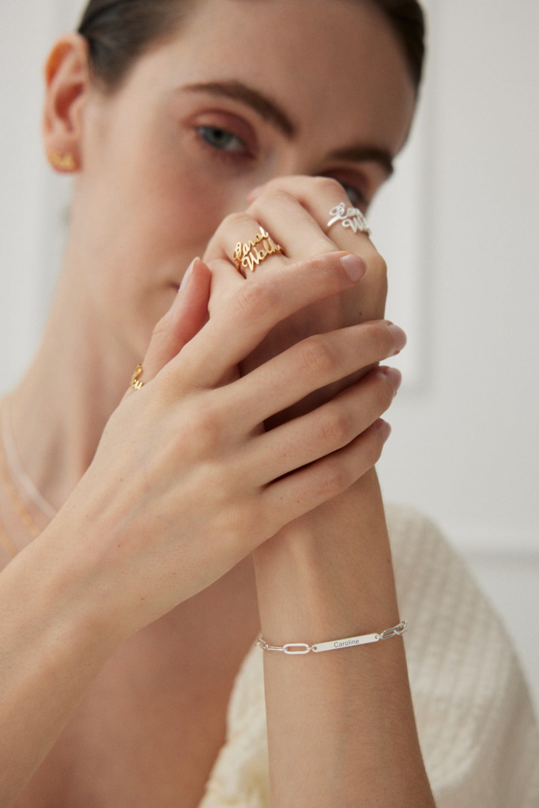 A beautiful Personalized Custom Letter Silver Bracelet featuring engraved letters, made from high-quality 925 Sterling Silver, displayed elegantly.