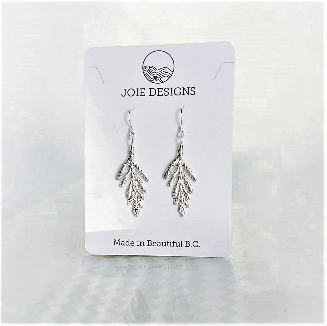 Petite Arborvitae Cedar Leaf Dangle Earrings in sterling silver, showcasing intricate leaf design.