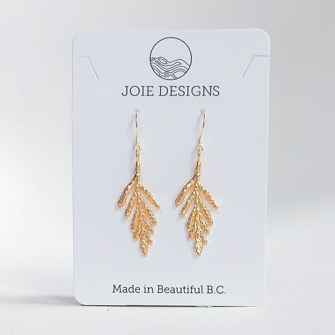 Petite Arborvitae Cedar Leaf Dangle Earrings in sterling silver, showcasing intricate leaf design.