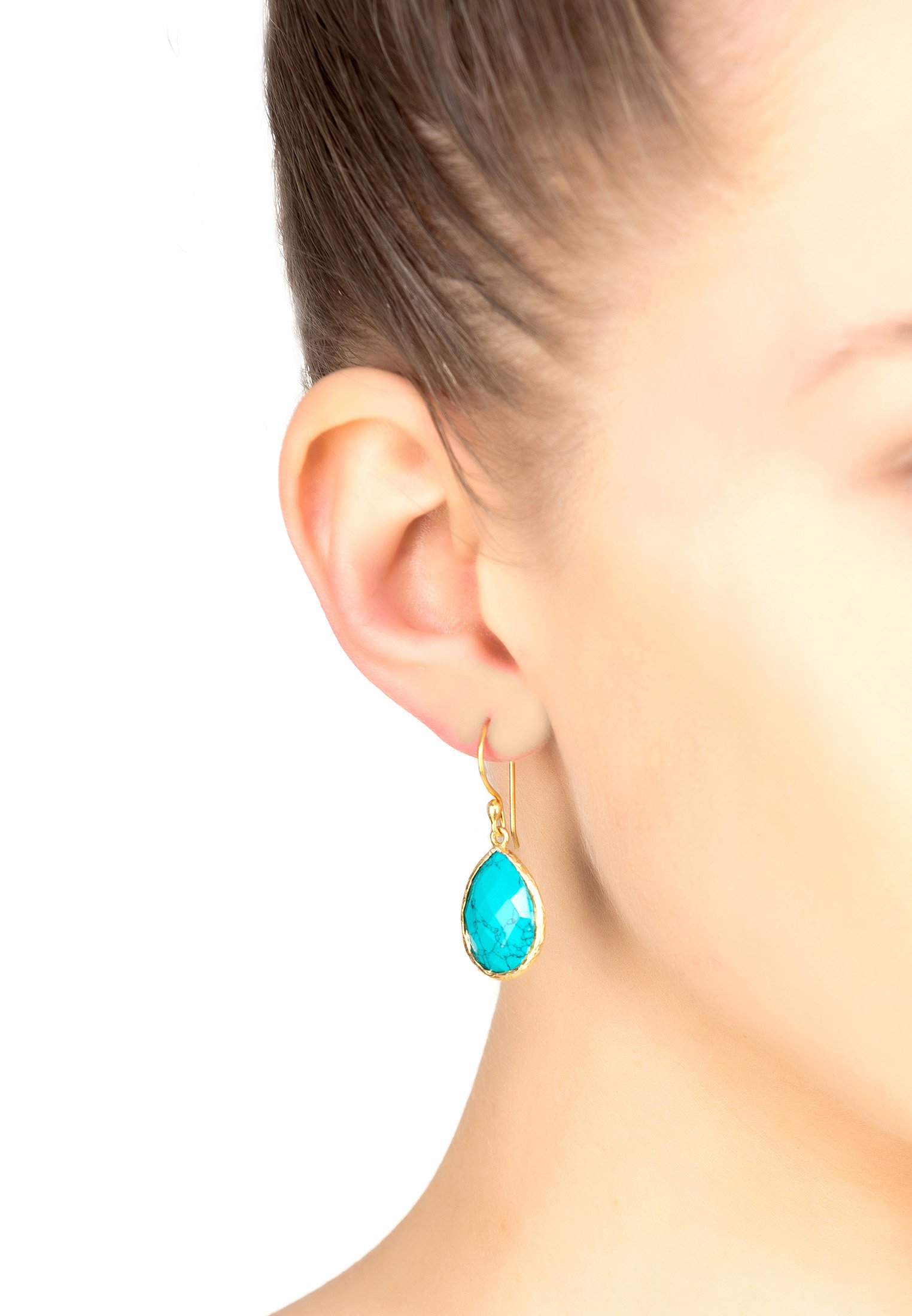 Petite drop earrings featuring Arizona turquoise set in textured gold, showcasing unique veining and elegant design.