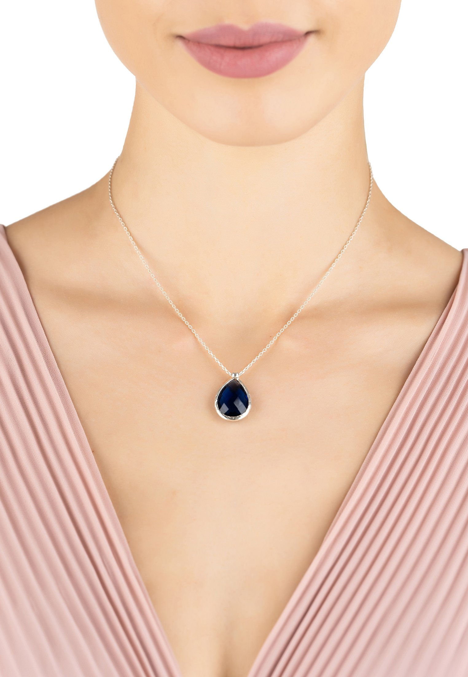 Petite Drop Necklace in Silver featuring a vibrant Sapphire Hydro gemstone, elegantly designed with a teardrop shape and adjustable chain.