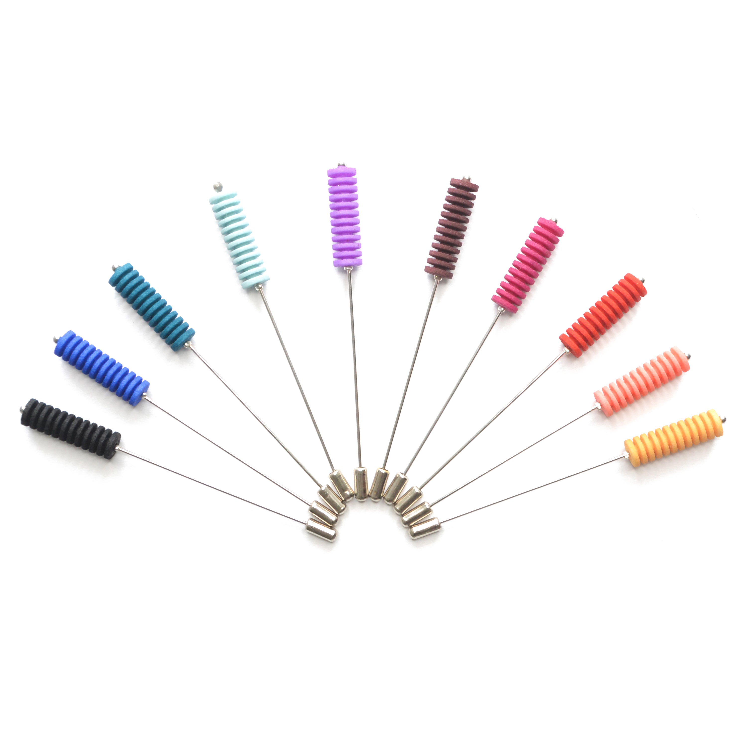 Optical Pin Brooch in various bold colors, showcasing its minimalistic design and versatility as a fashion accessory.