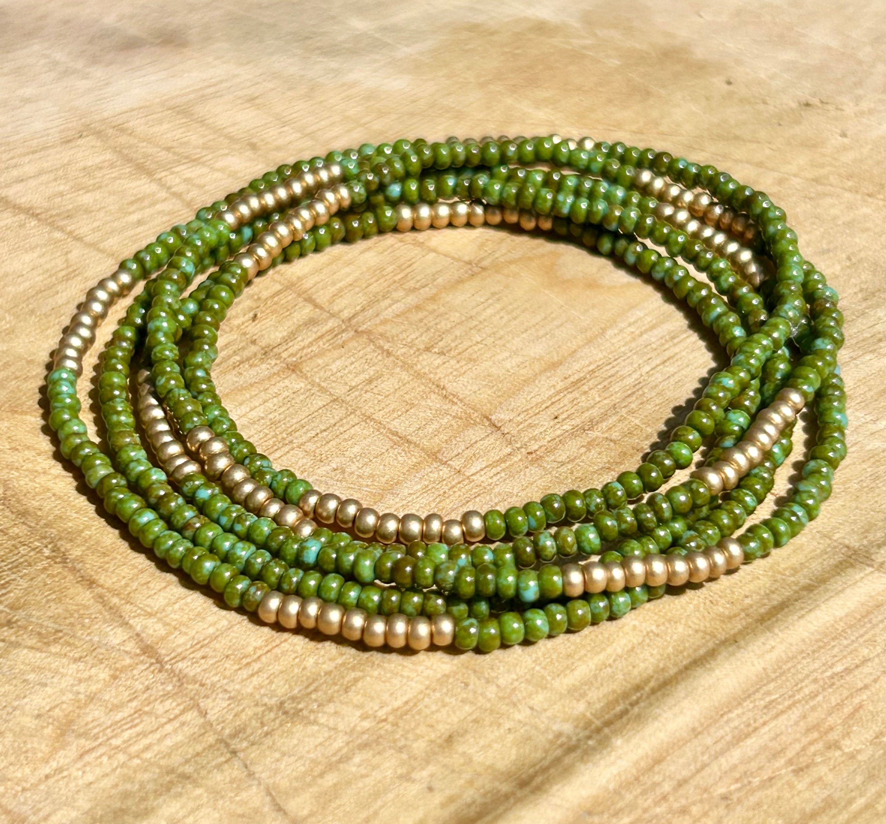 Pine Green & Gold-Striped Beaded 5-Wrap Bracelet made of Czech glass seed beads, showcasing a chic design with metallic gold accents.