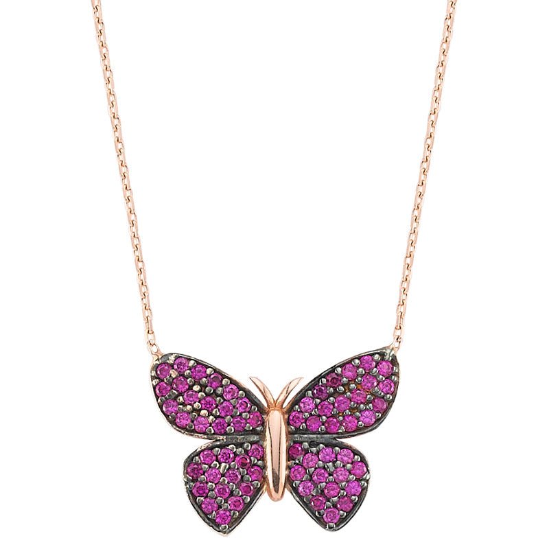 A beautiful Pink Butterfly Silver Necklace featuring a sparkling CZ crystal pendant, handmade from 925 sterling silver.