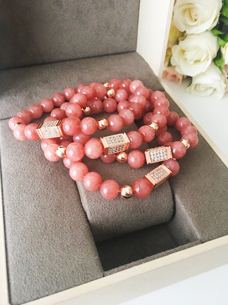 A beautiful pink opal bracelet featuring 8mm beads on a strong elastic cord, perfect for daily wear and emotional healing.