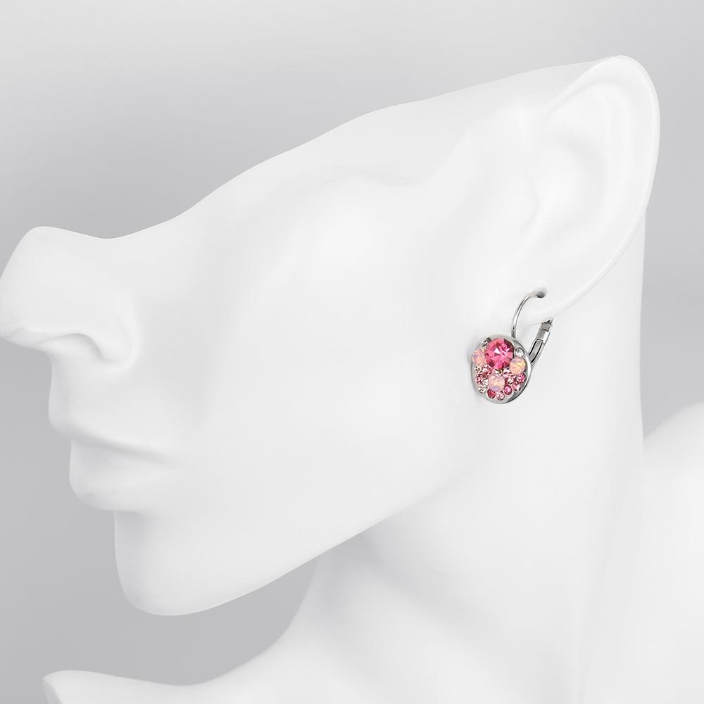 Elegant Pink Periwinkle Leverback Earrings crafted in 18K white gold, featuring certified crystals and a lightweight design.