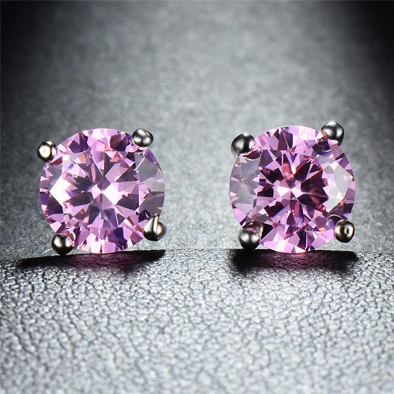 Elegant 7mm stud earrings featuring pink topaz onyx and sparkling crystals, crafted in 18K white gold.