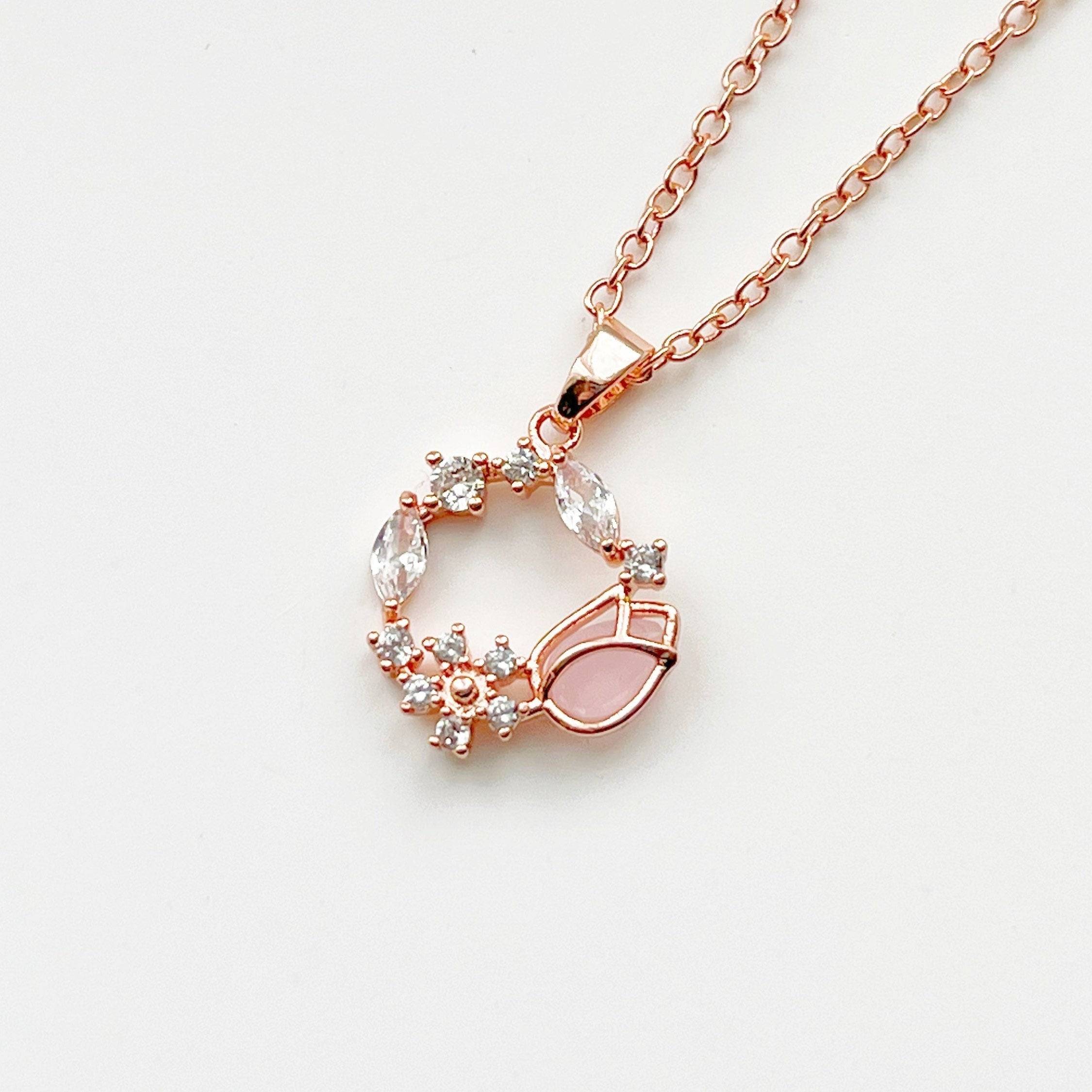 Elegant Pink Tulip Necklace featuring a flower-shaped crystal in rose gold plating, perfect for spring and special occasions.