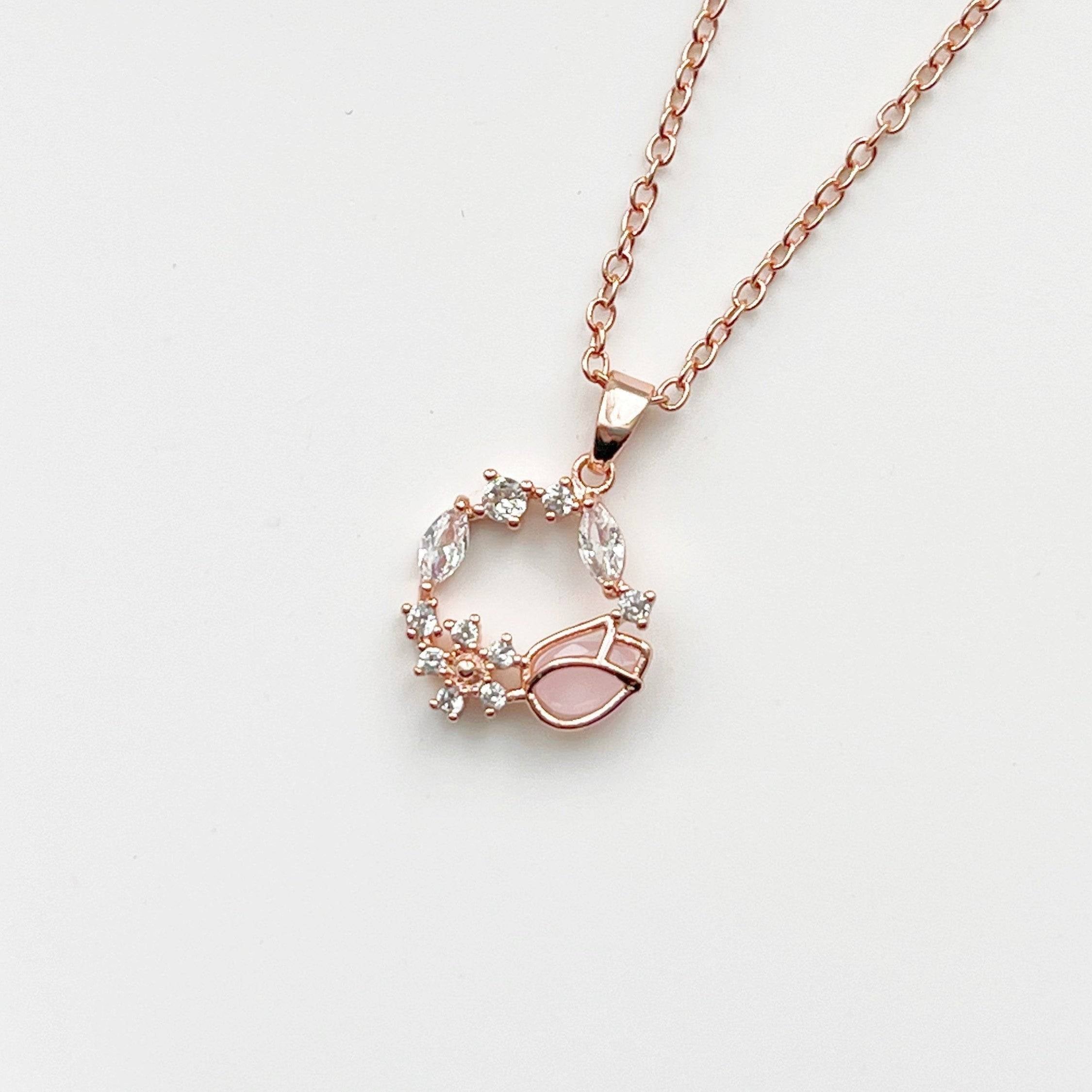 Elegant Pink Tulip Necklace featuring a flower-shaped crystal in rose gold plating, perfect for spring and special occasions.