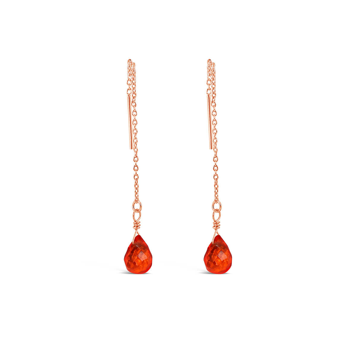 Dangling earrings with red gemstones