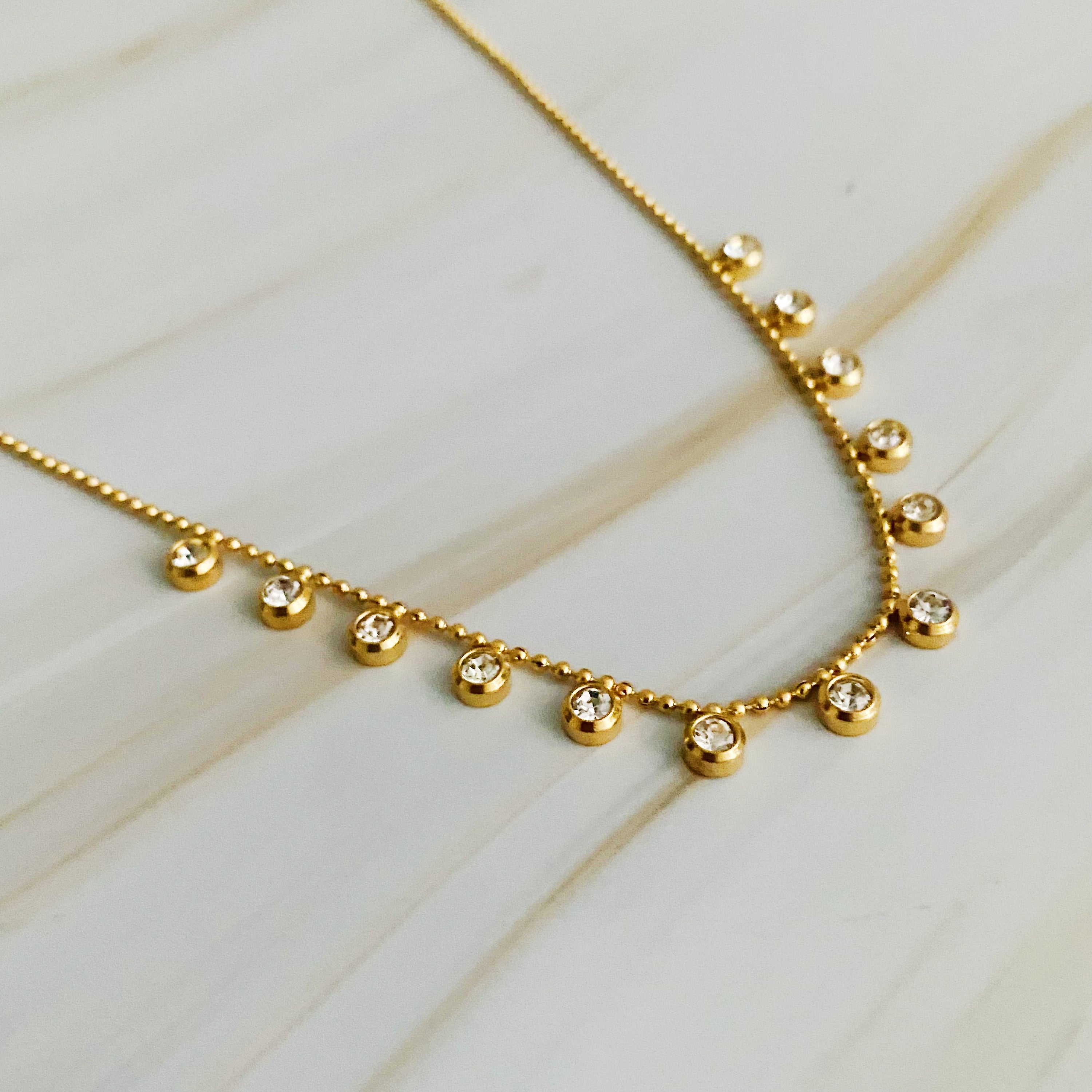 Elegant Point Your Beauty Out Necklace with 13 dazzling dangle drops and delicate beading, showcasing its luxurious design.