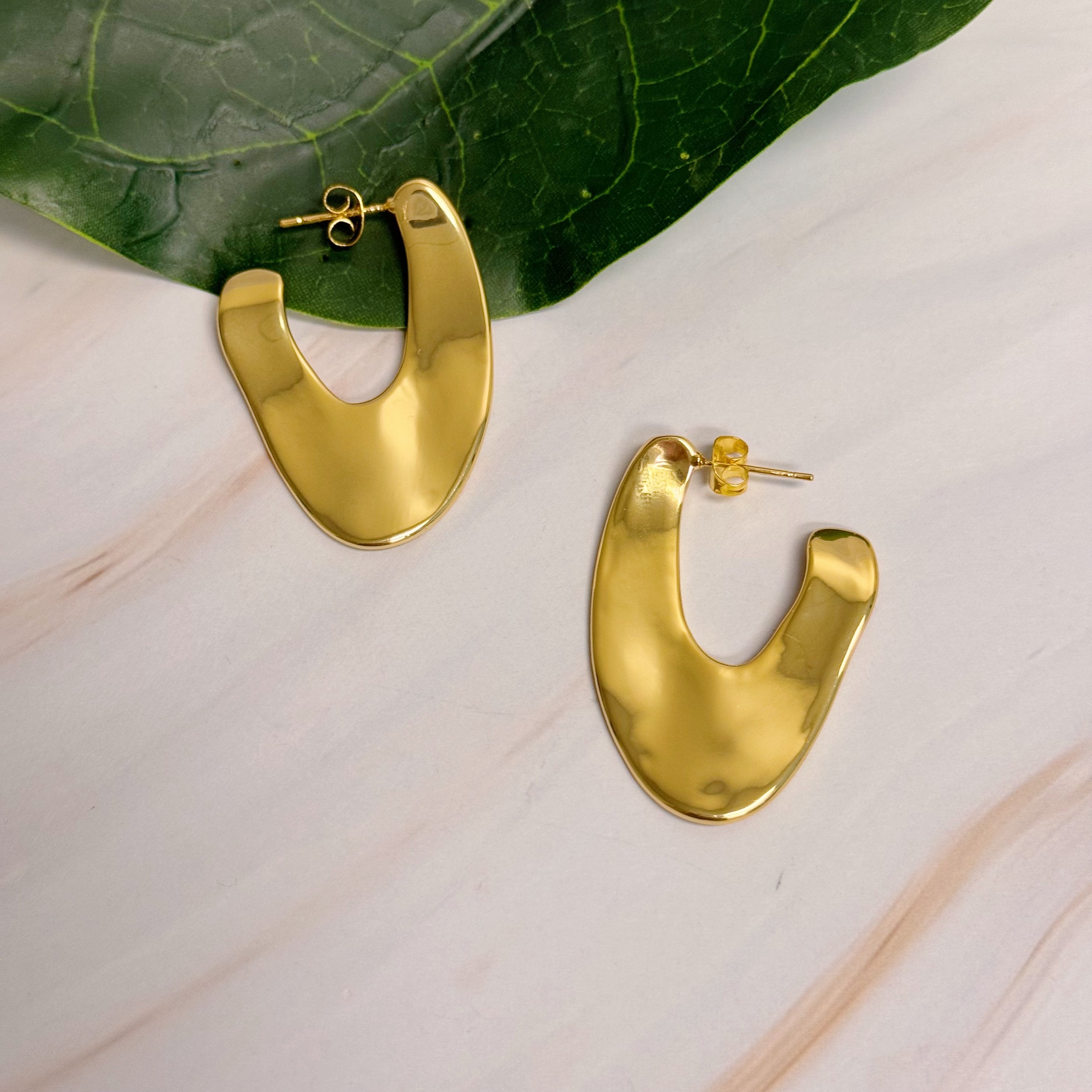 Polished Golden Art Hoop Earrings showcasing a sleek and minimalist design, crafted from 18k gold plated brass.