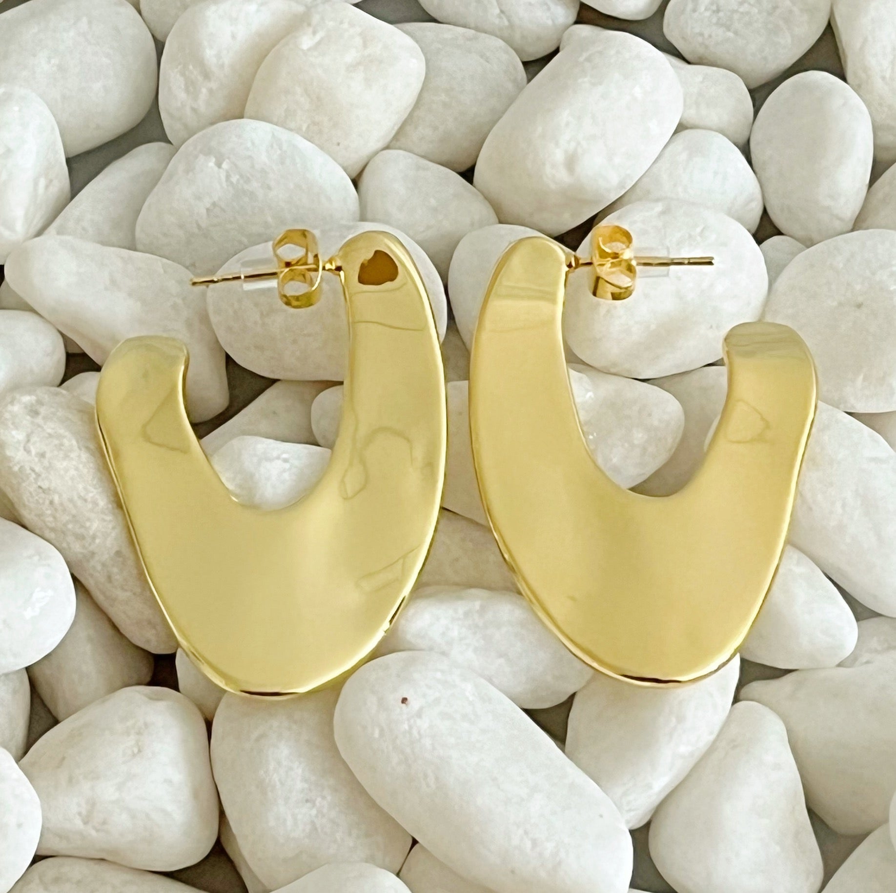 Polished Golden Art Hoop Earrings showcasing a sleek and minimalist design, crafted from 18k gold plated brass.