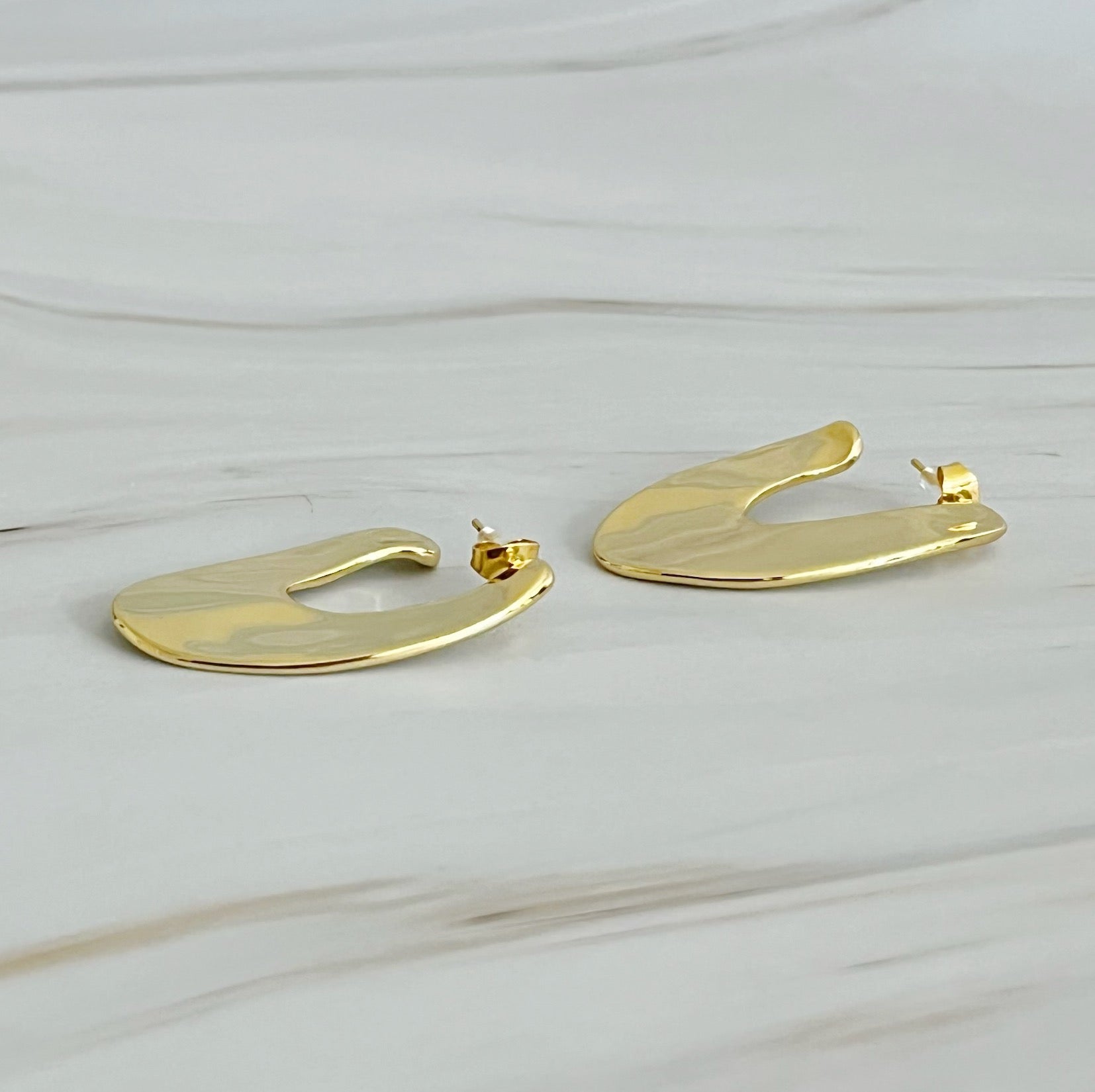 Polished Golden Art Hoop Earrings showcasing a sleek and minimalist design, crafted from 18k gold plated brass.