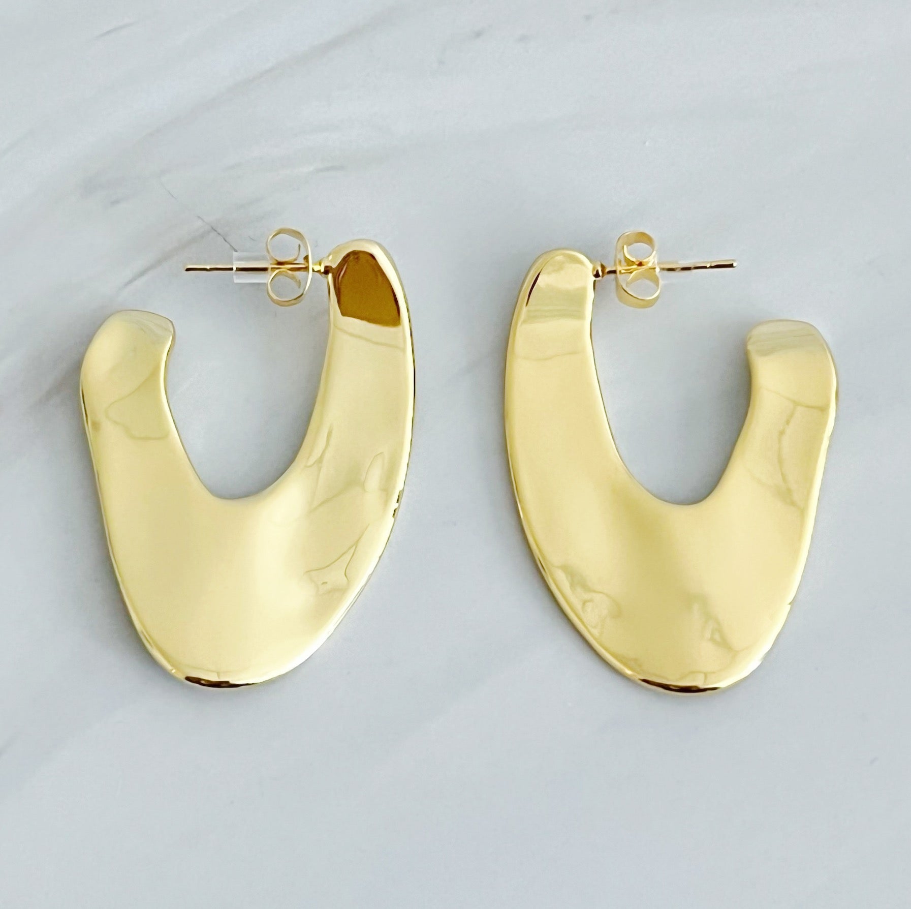 Polished Golden Art Hoop Earrings showcasing a sleek and minimalist design, crafted from 18k gold plated brass.