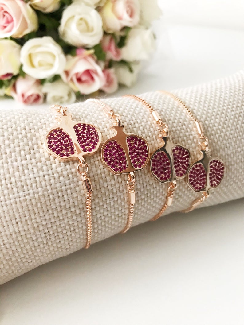 Adjustable rose gold Pomegranate Bracelet featuring a lucky zircon charm, elegantly designed for everyday wear.