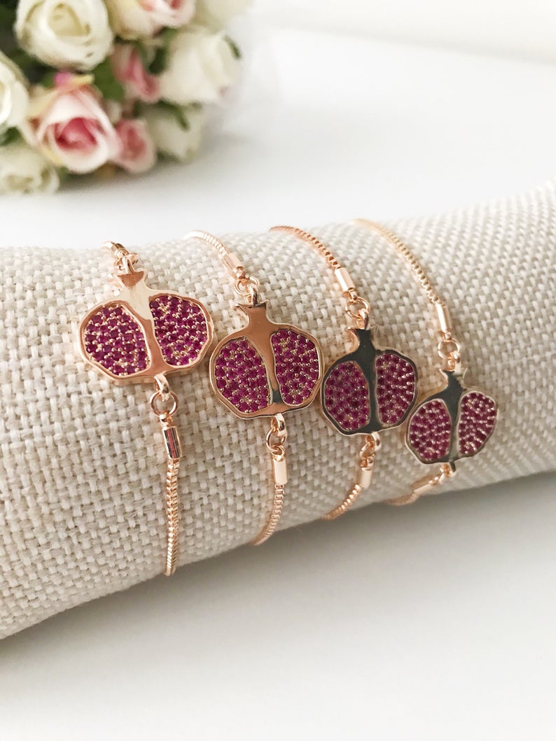 Adjustable rose gold Pomegranate Bracelet featuring a lucky zircon charm, elegantly designed for everyday wear.