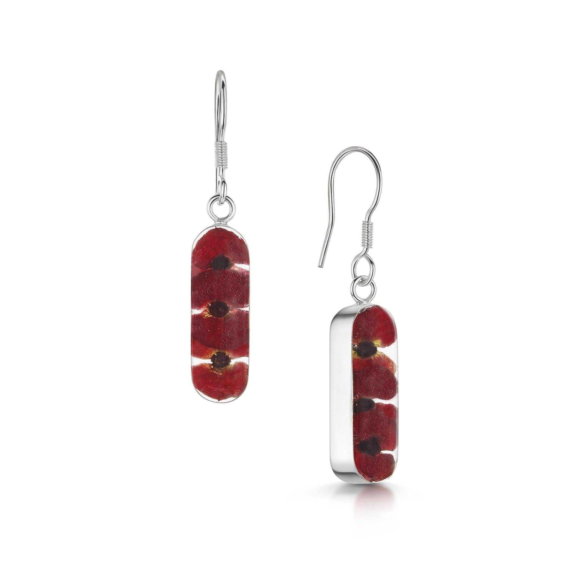 Elegant Poppy drop earrings 'Leela' featuring tiny red Euphorbia Milii flowers in sterling silver vertical bar design.