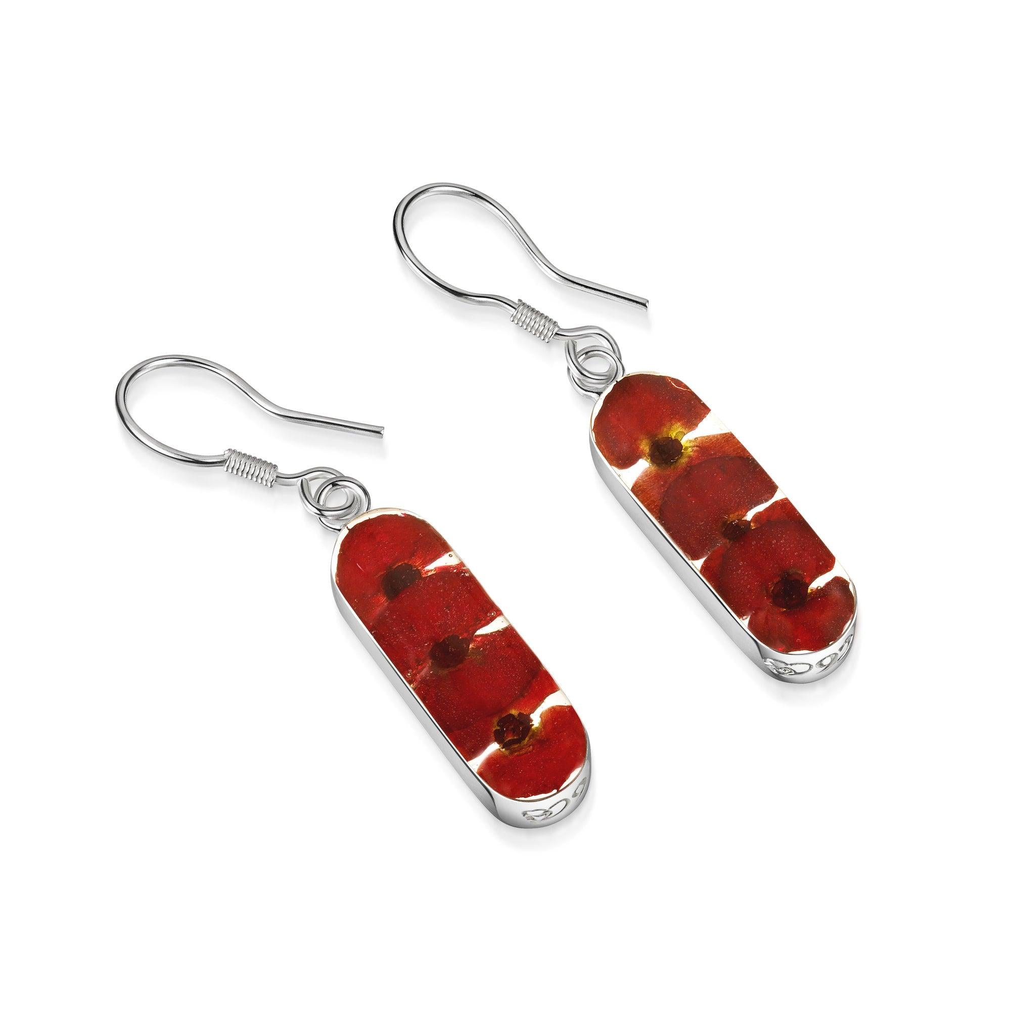 Elegant Poppy drop earrings 'Leela' featuring tiny red Euphorbia Milii flowers in sterling silver vertical bar design.