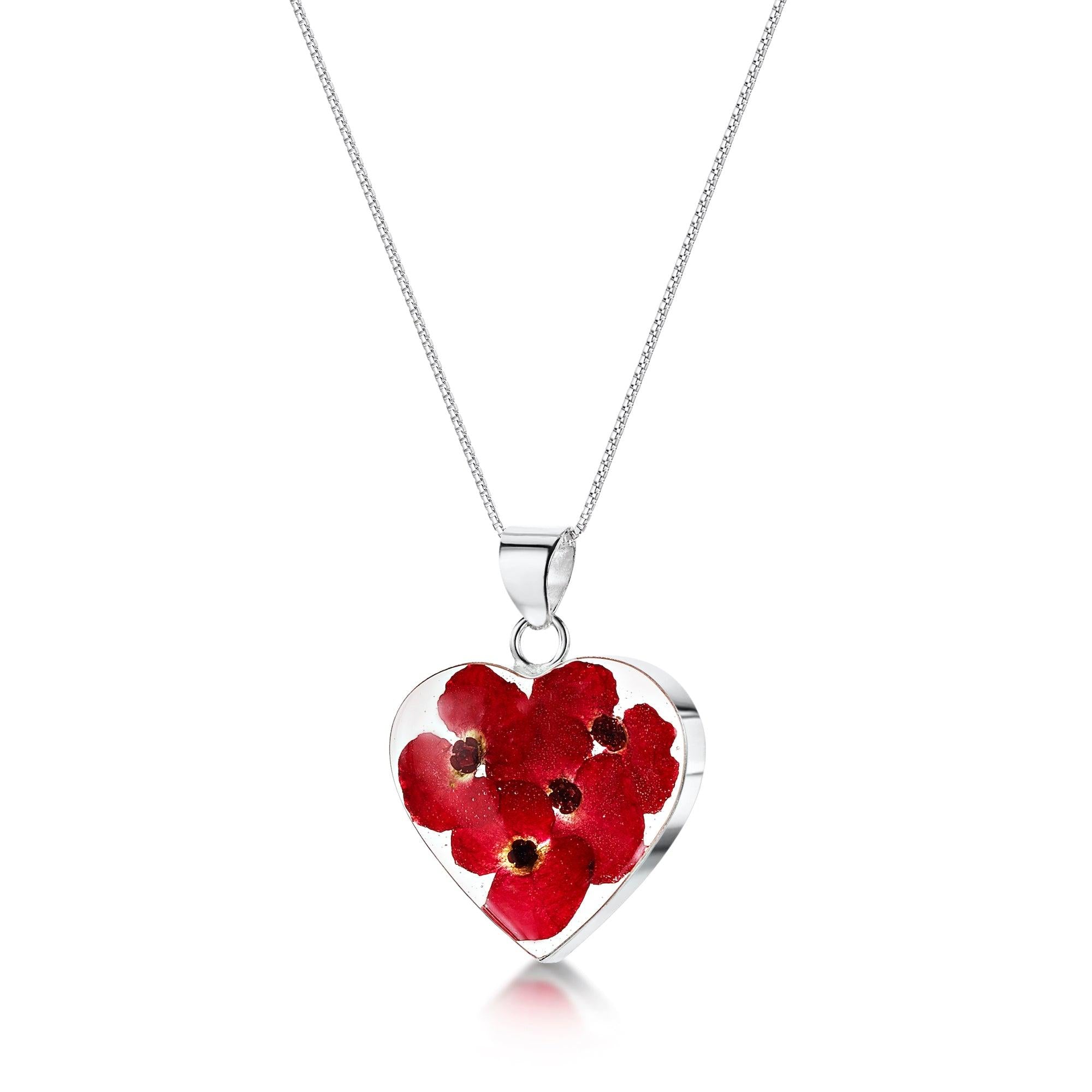 Poppy heart necklace by Shrieking Violet, featuring a sterling silver pendant with real poppy flowers, displayed in a stylish gift box.