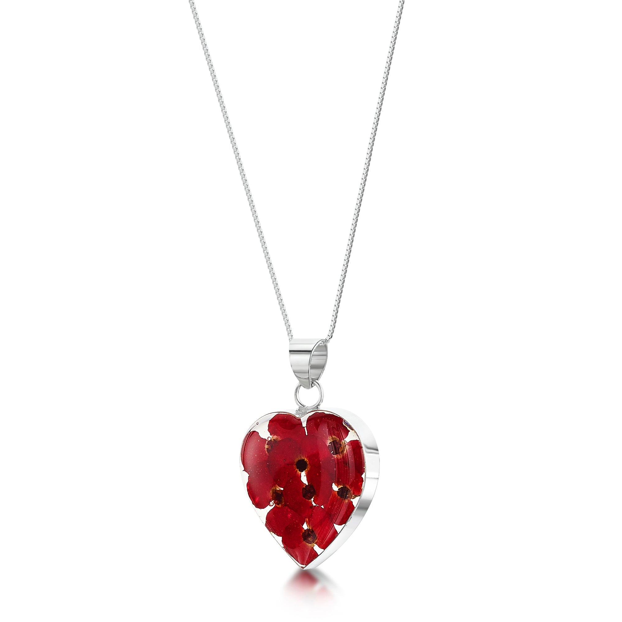 Poppy heart necklace by Shrieking Violet, featuring a sterling silver pendant with real poppy flowers, displayed in a stylish gift box.