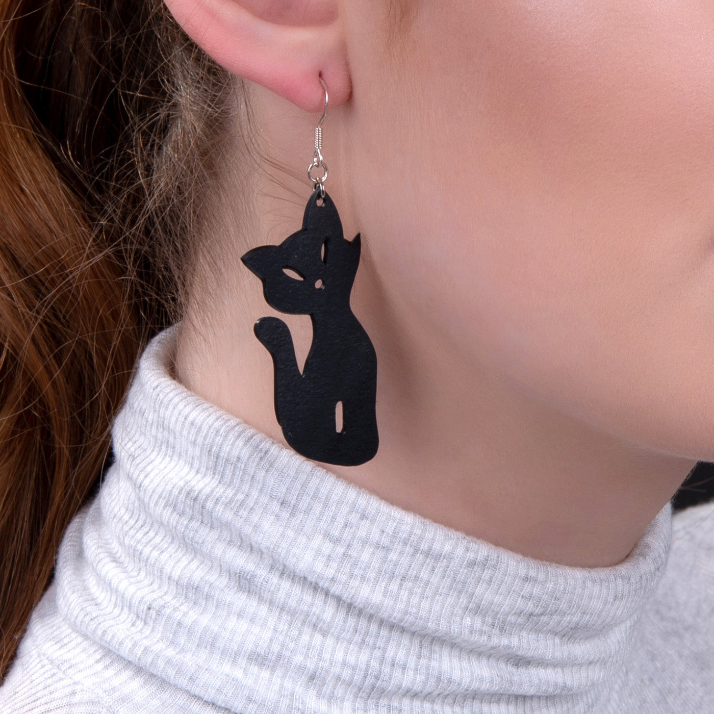 Poppy Recycled Rubber Cat Earrings, handcrafted from recycled inner tubes, featuring unique textures and sterling silver hooks.