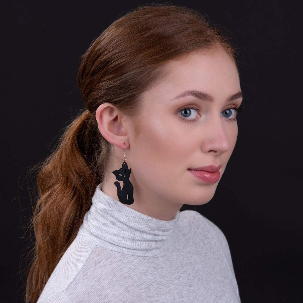 Poppy Recycled Rubber Cat Earrings, handcrafted from recycled inner tubes, featuring unique textures and sterling silver hooks.