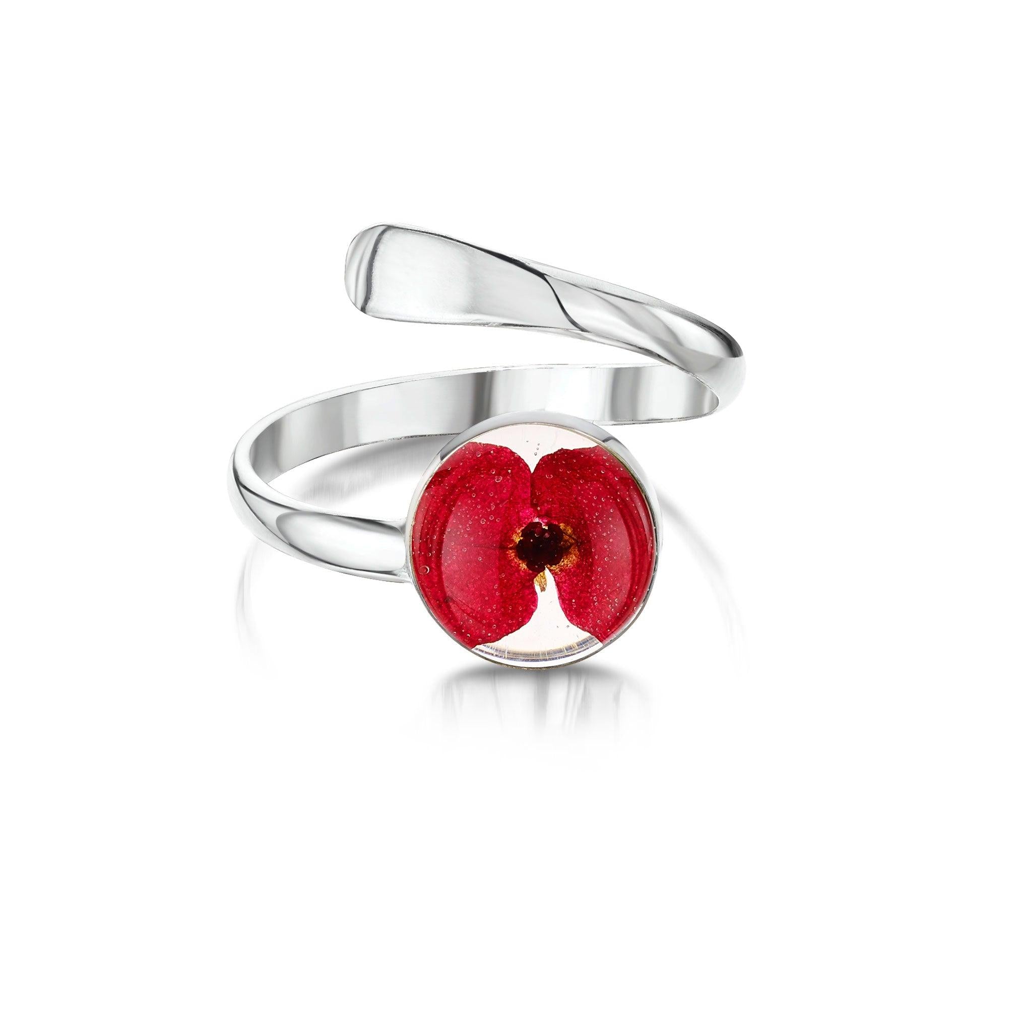 Poppy ring by Shrieking Violet, featuring real flowers in an adjustable sterling silver design, elegantly displayed in a gift box.