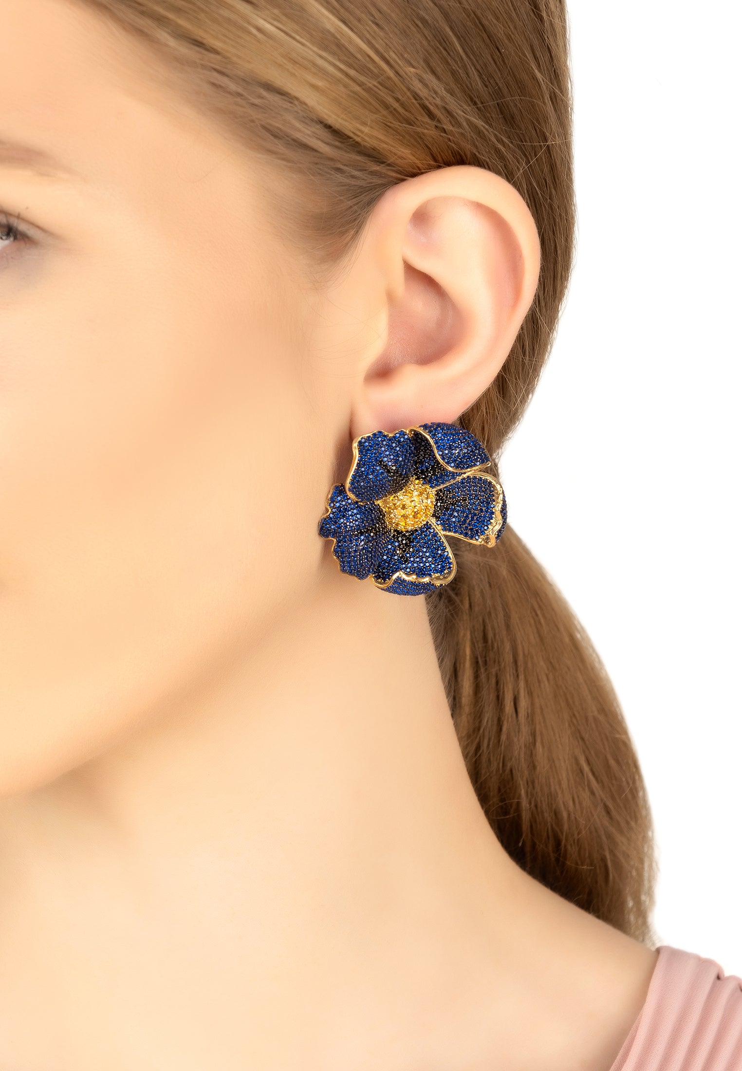 Elegant Poppy Sapphire Blue Earrings Gold with cubic zirconia, featuring a floral design and 22ct gold finish.