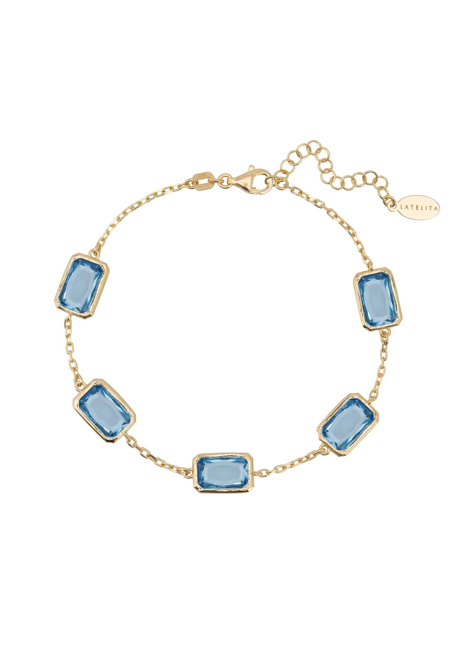 Portofino Bracelet in gold featuring blue Topaz gemstones, elegantly designed with a fine chain and adjustable clasp.