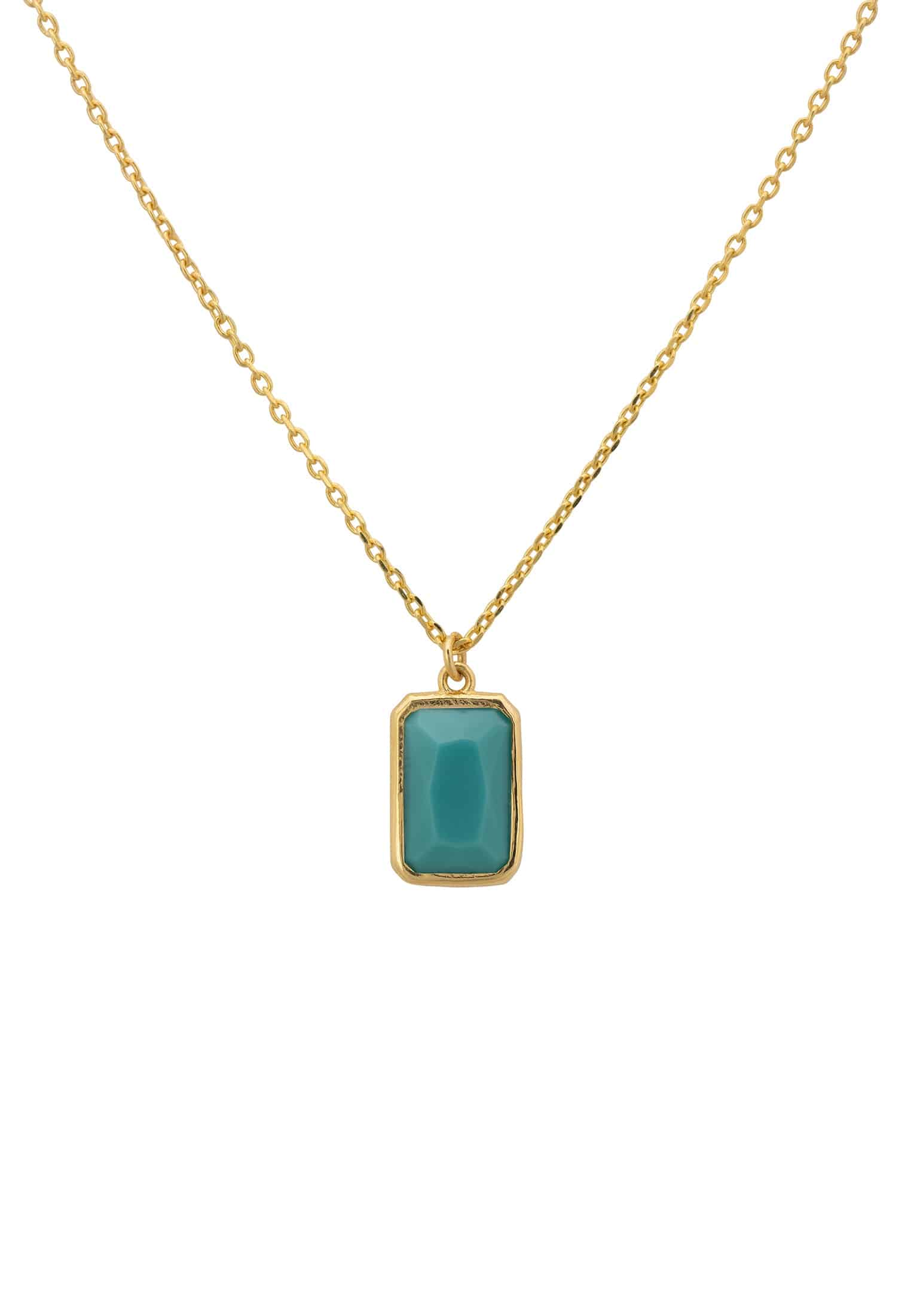 Portofino Necklace featuring a turquoise gemstone set in a gold-dipped sterling silver setting, elegantly displayed against a soft background.