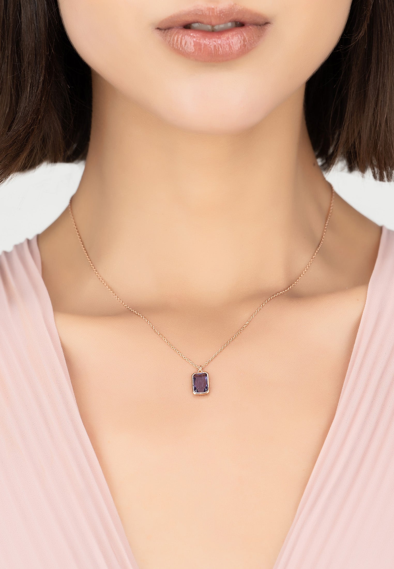 Portofino Necklace featuring a rectangular amethyst gemstone set in a 22ct rosegold dipped sterling silver frame, elegantly displayed.