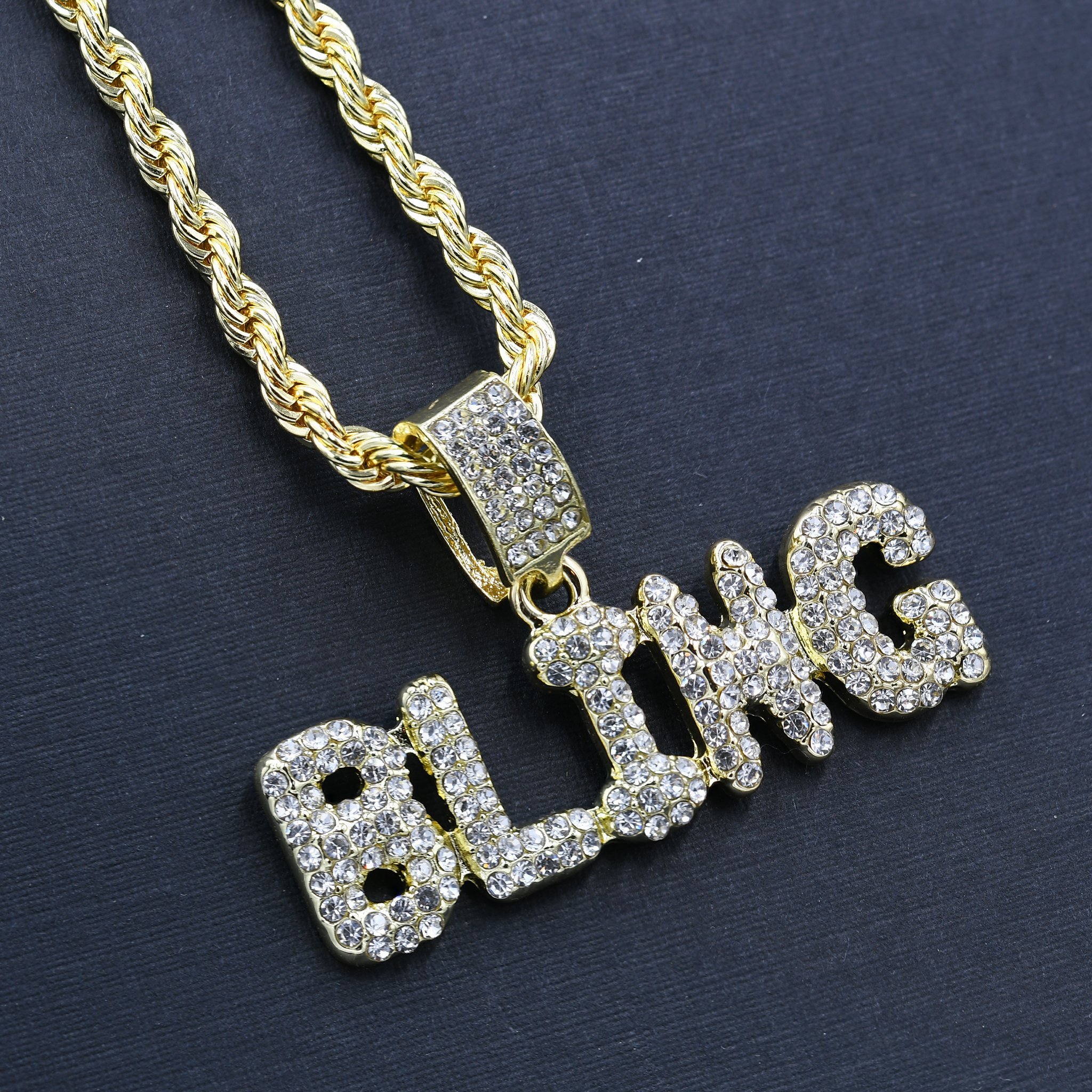 PRAY AND CHARM HC37657 hip-hop chain with crystal-studded pendant on a 24-inch rope chain, showcasing intricate design and sparkle.