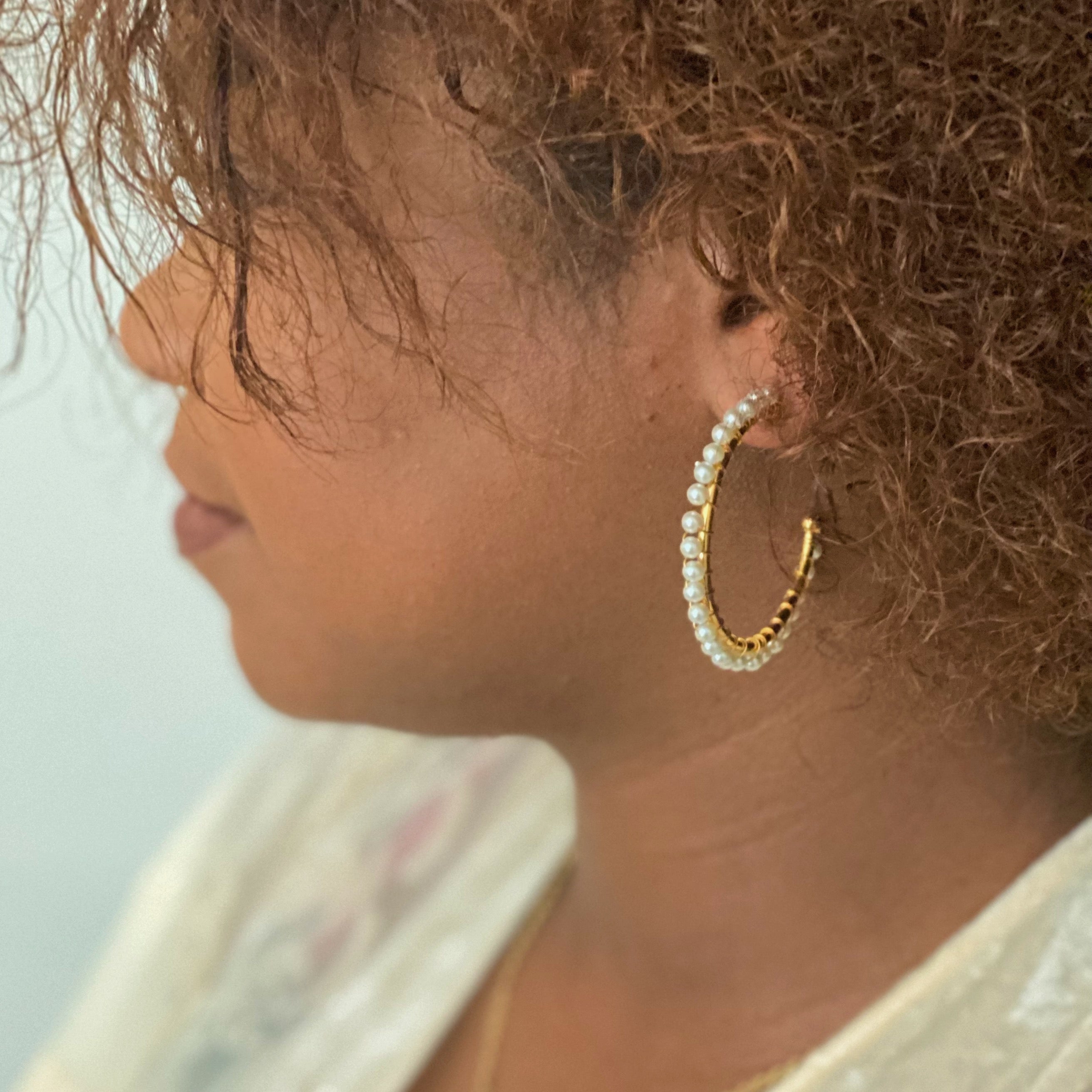 A pair of elegant Precious Pearl Bead Hoop Earrings featuring hand wired pearl beads and 18K gold plated brass, perfect for any occasion.