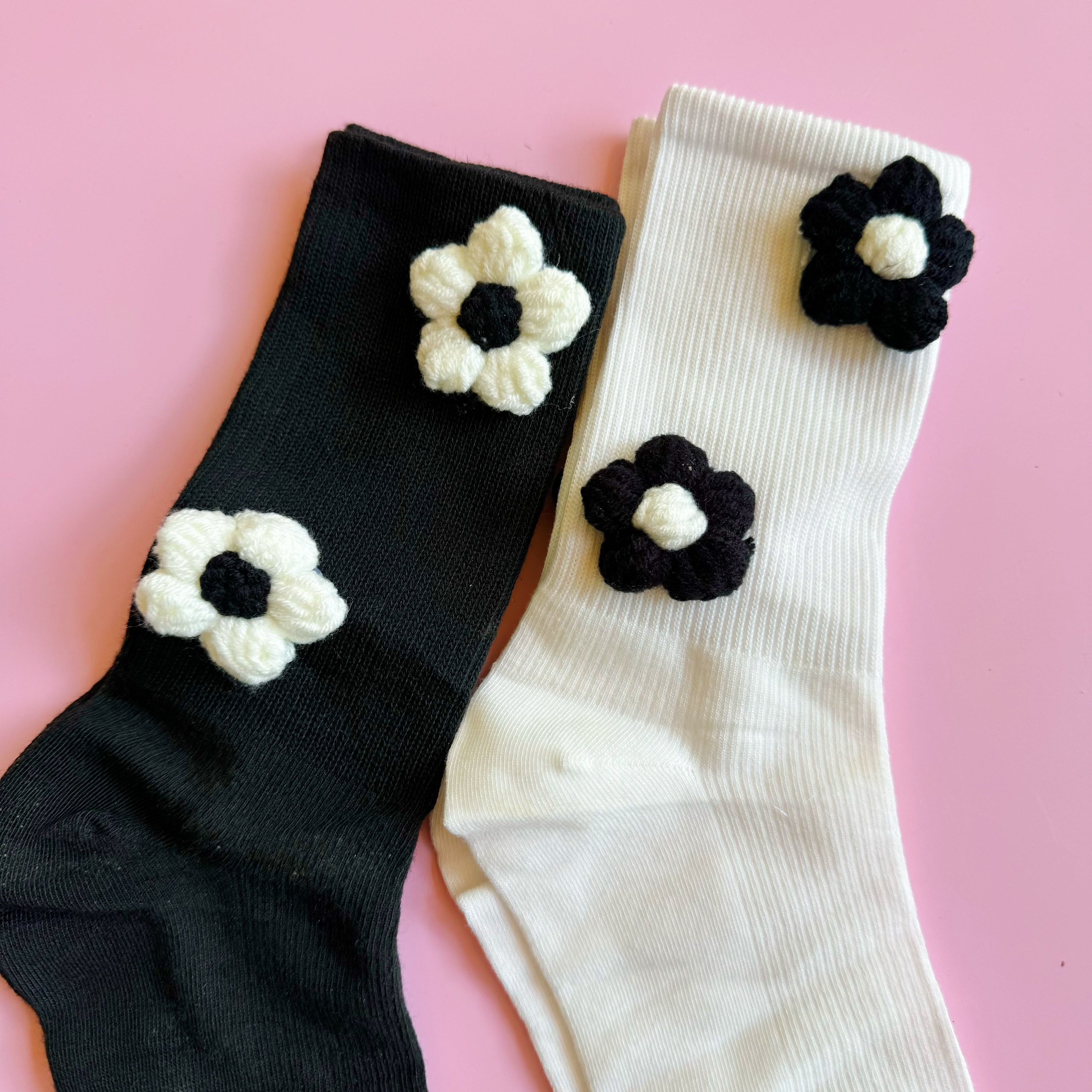 Puffy Daisy Embellished Socks Set of 2 featuring a chic black and white design with delicate flower embellishments, perfect for stylish outfits.