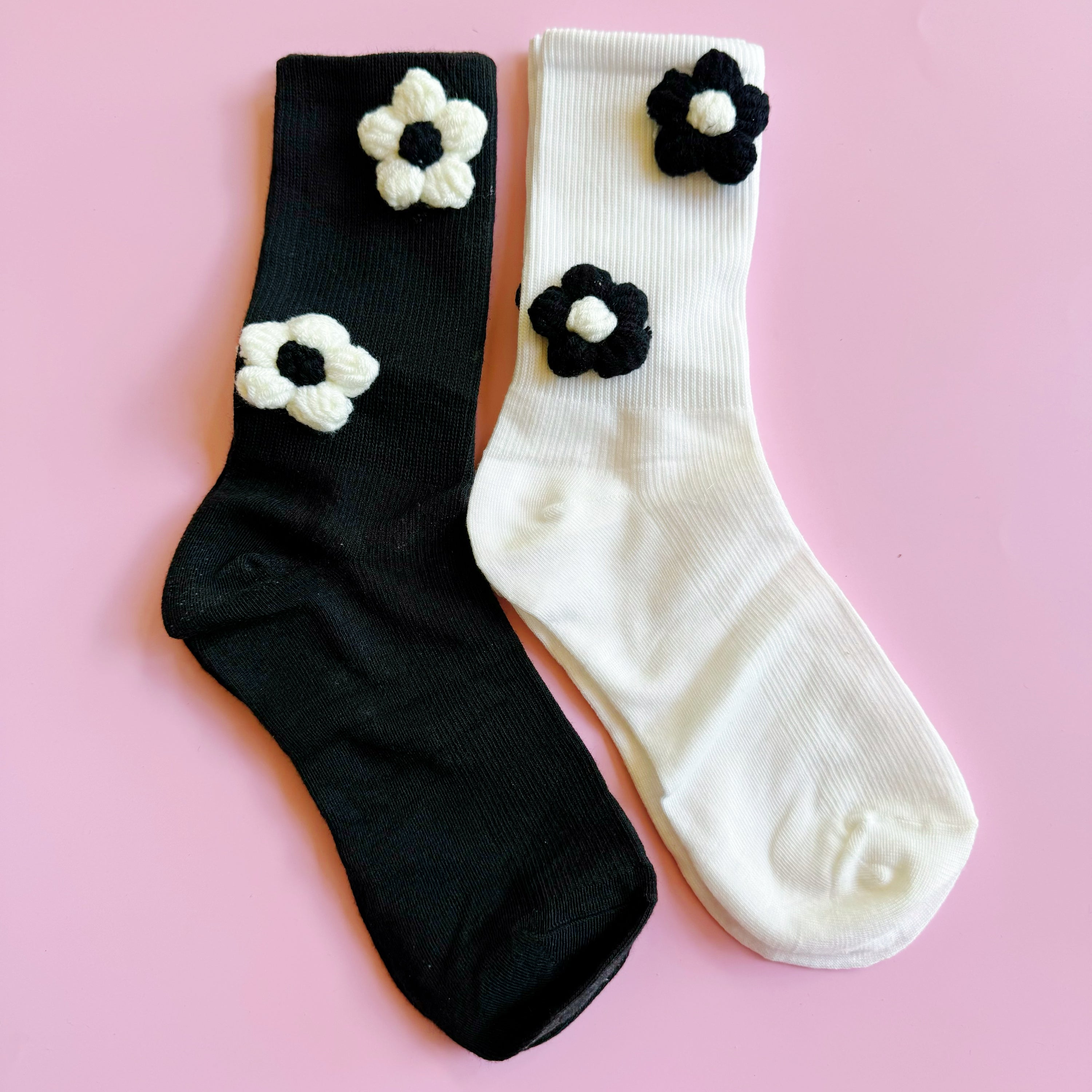 Puffy Daisy Embellished Socks Set of 2 featuring a chic black and white design with delicate flower embellishments, perfect for stylish outfits.