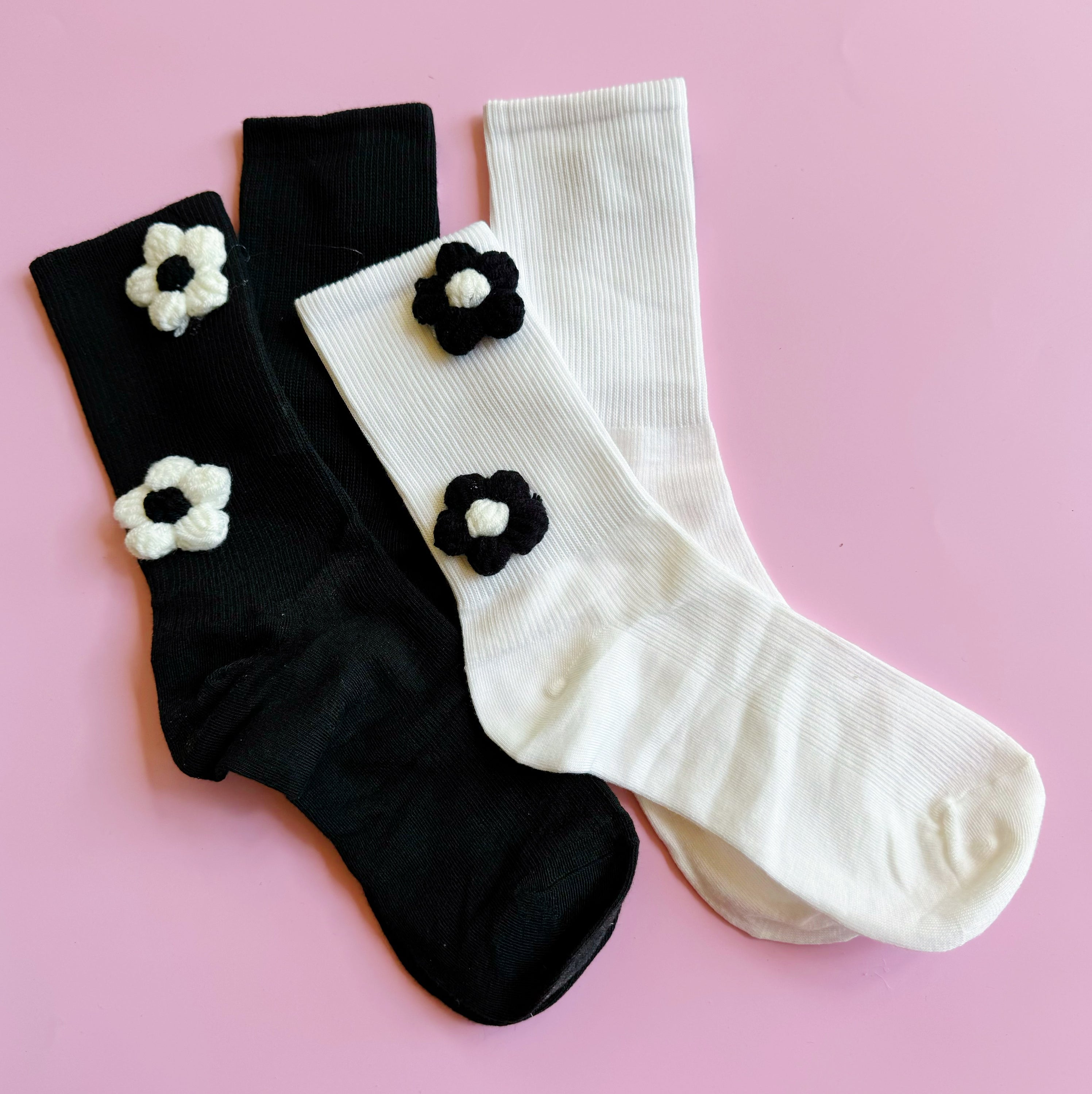 Puffy Daisy Embellished Socks Set of 2 featuring a chic black and white design with delicate flower embellishments, perfect for stylish outfits.