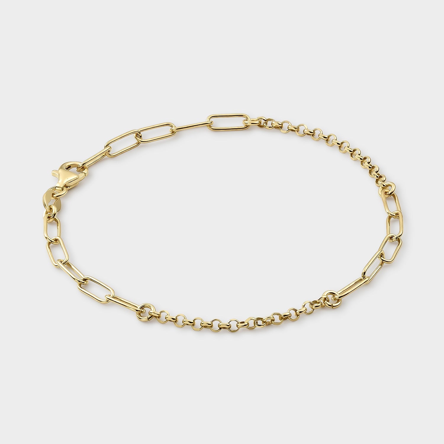 Pulsera de oro con eslabones nudo y rectangulares, elegante y brillante, ideal para cualquier ocasión.