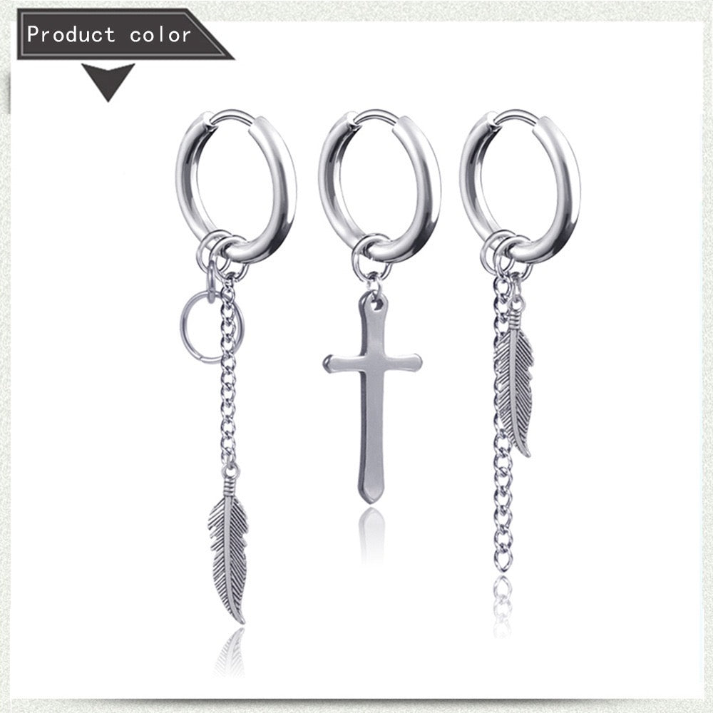 Punk stainless steel hoop earrings with leaf and cross tassels, showcasing a bold and edgy design.