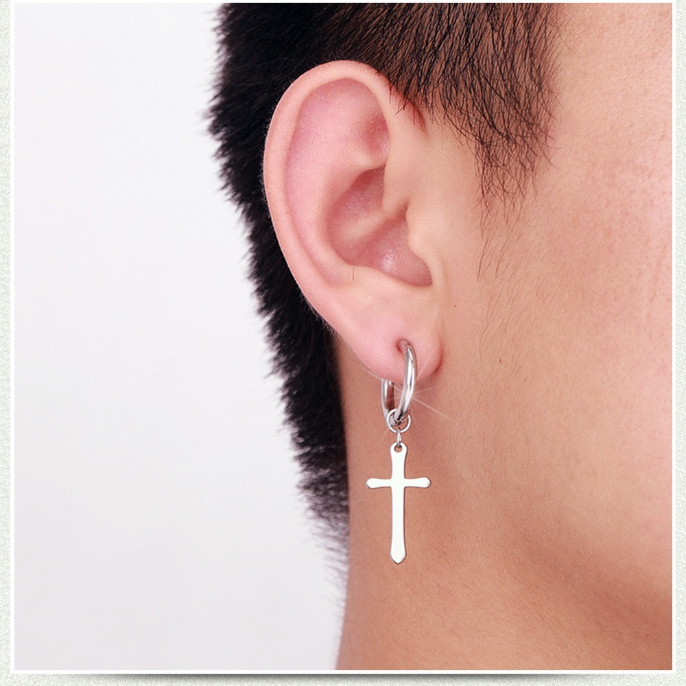 Punk stainless steel hoop earrings with leaf and cross tassels, showcasing a bold and edgy design.